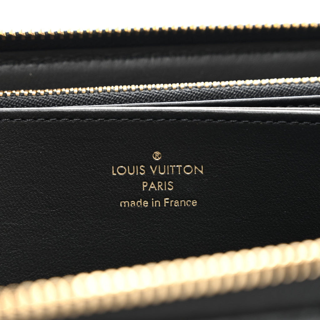 LOUIS VUITTON LAMBSKIN EMBOSSED MONOGRAM COUSSIN ZIPPY WALLET