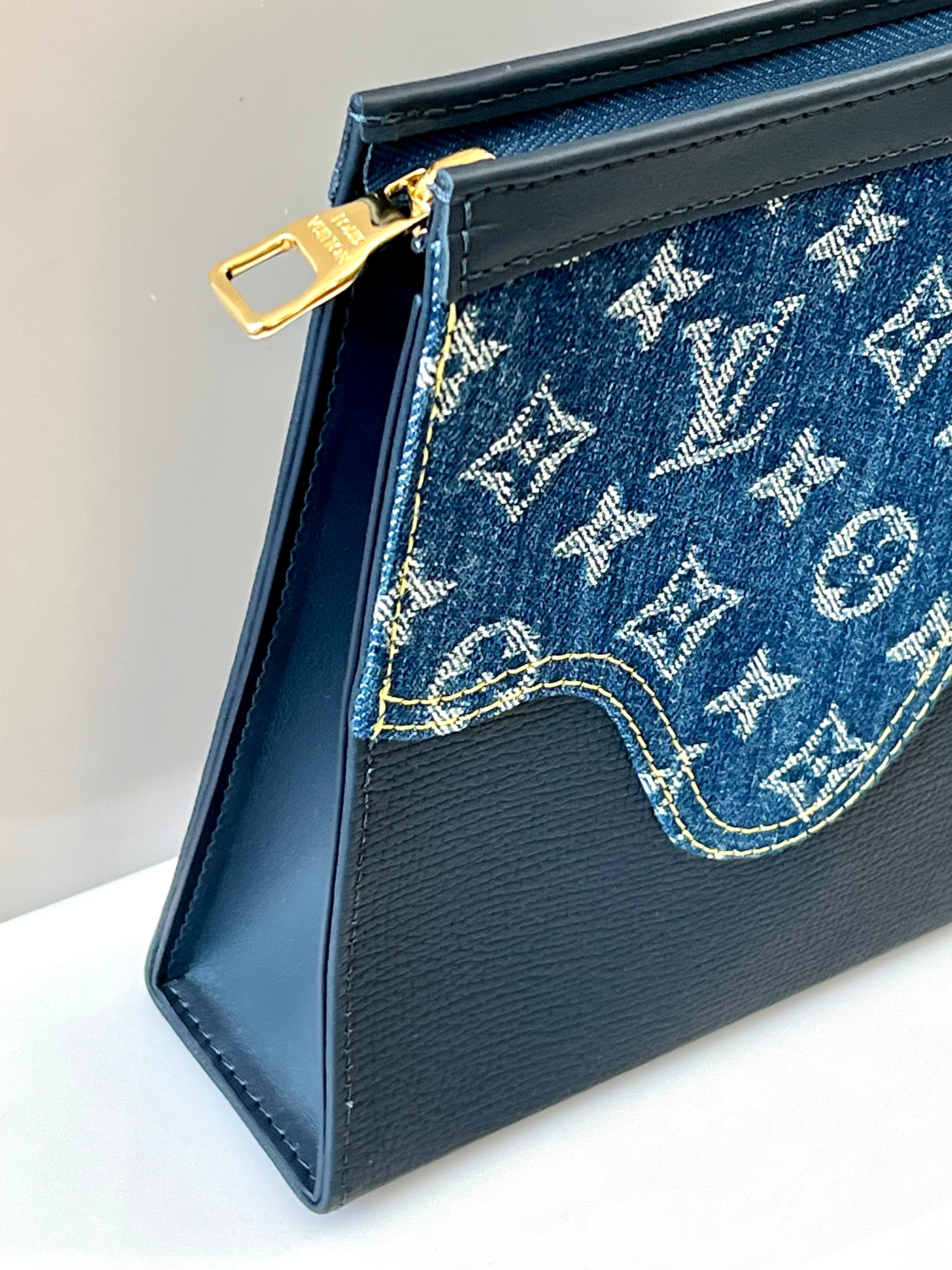 LOUIS VUITTON X NIGO MONGRAM DENIM VOYAGE MM CLUTCH BAG