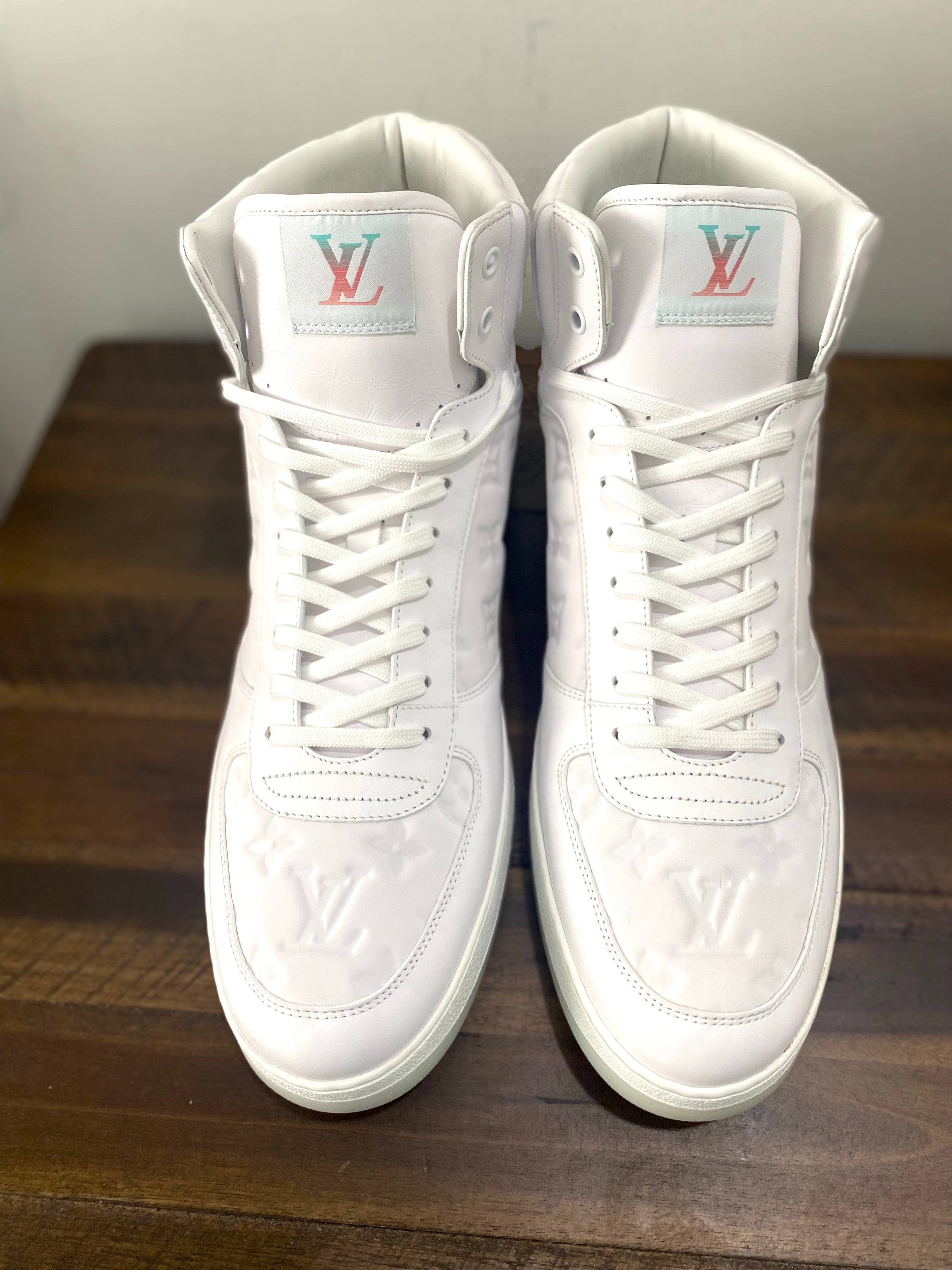 LOUIS VUITTON RIVOLI MONOGRAM LEATHER HI-TOP SNEAKERS