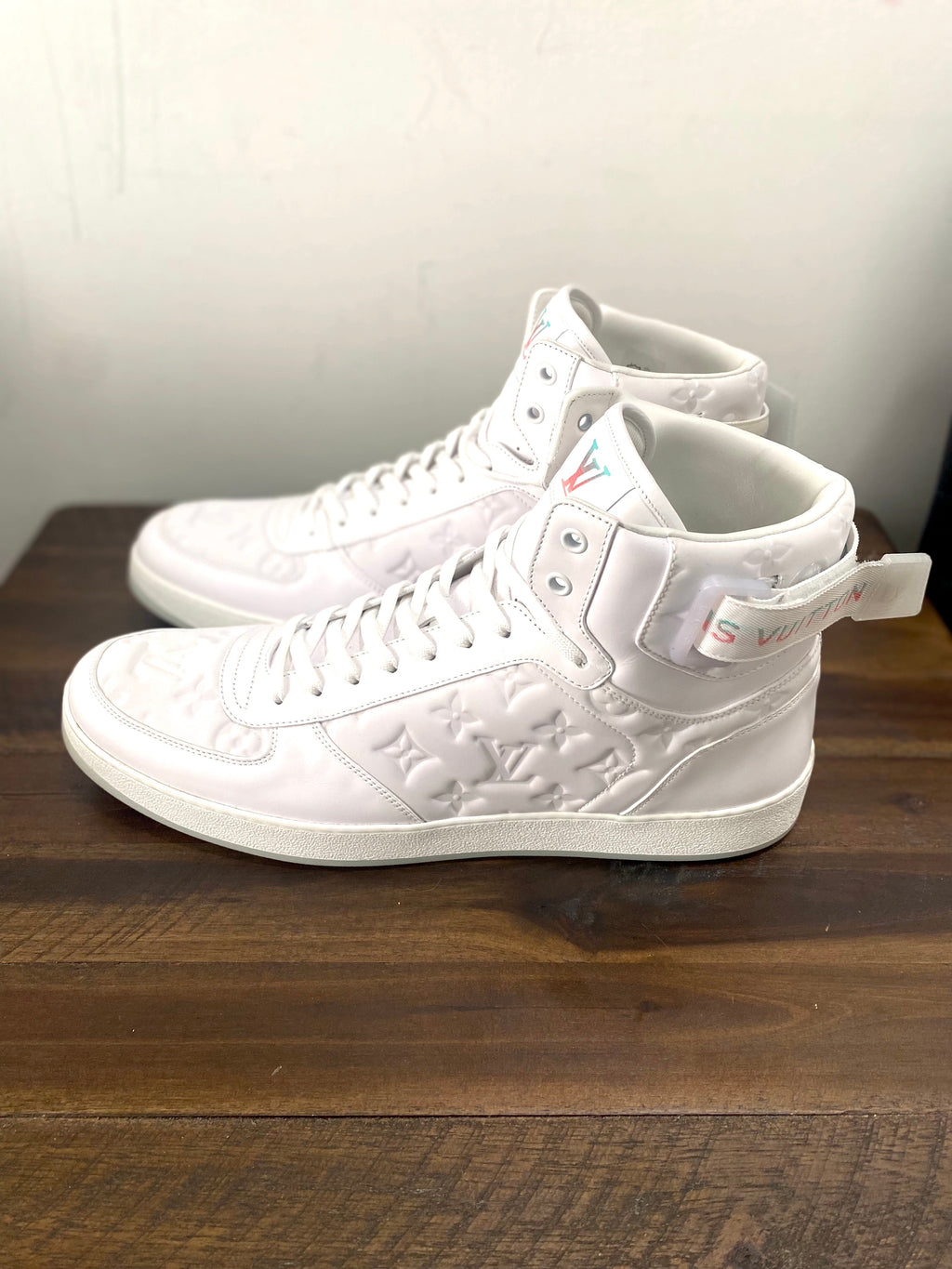 LOUIS VUITTON RIVOLI MONOGRAM LEATHER HI-TOP SNEAKERS