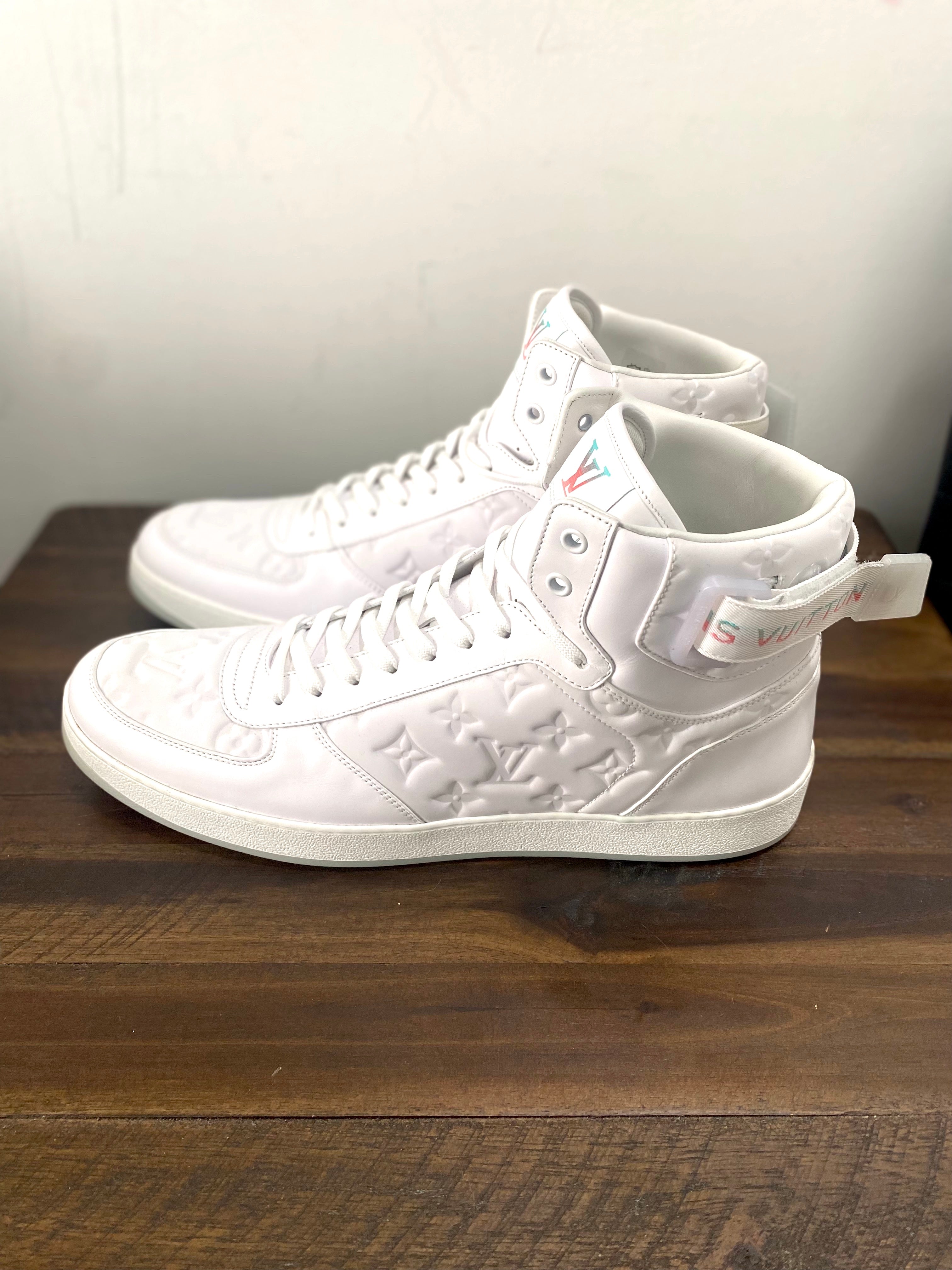 LOUIS VUITTON RIVOLI MONOGRAM LEATHER HI-TOP SNEAKERS