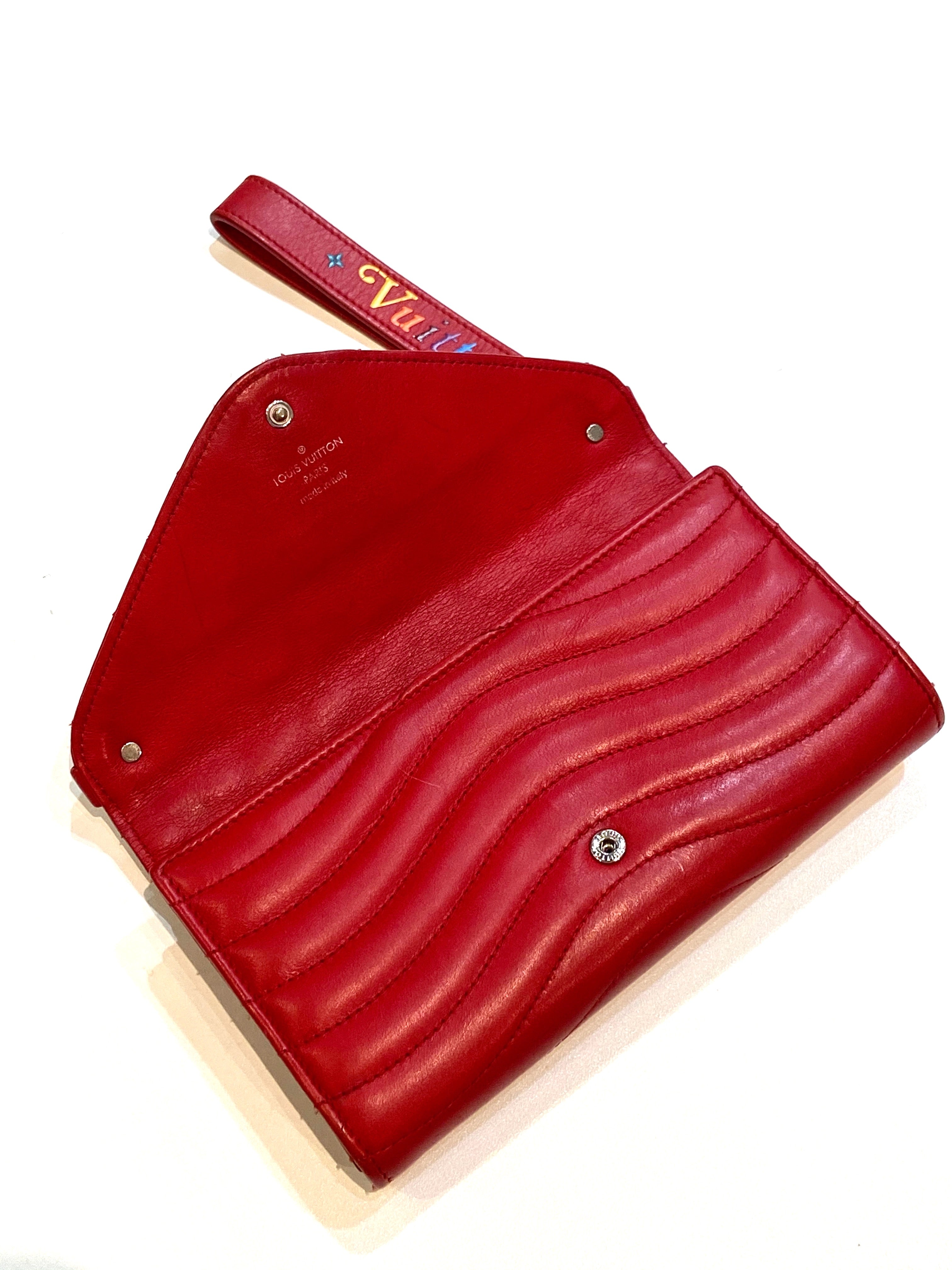 LOUIS VUITTON NEW WAVE LONG CALFSKIN WALLET WRISTLET