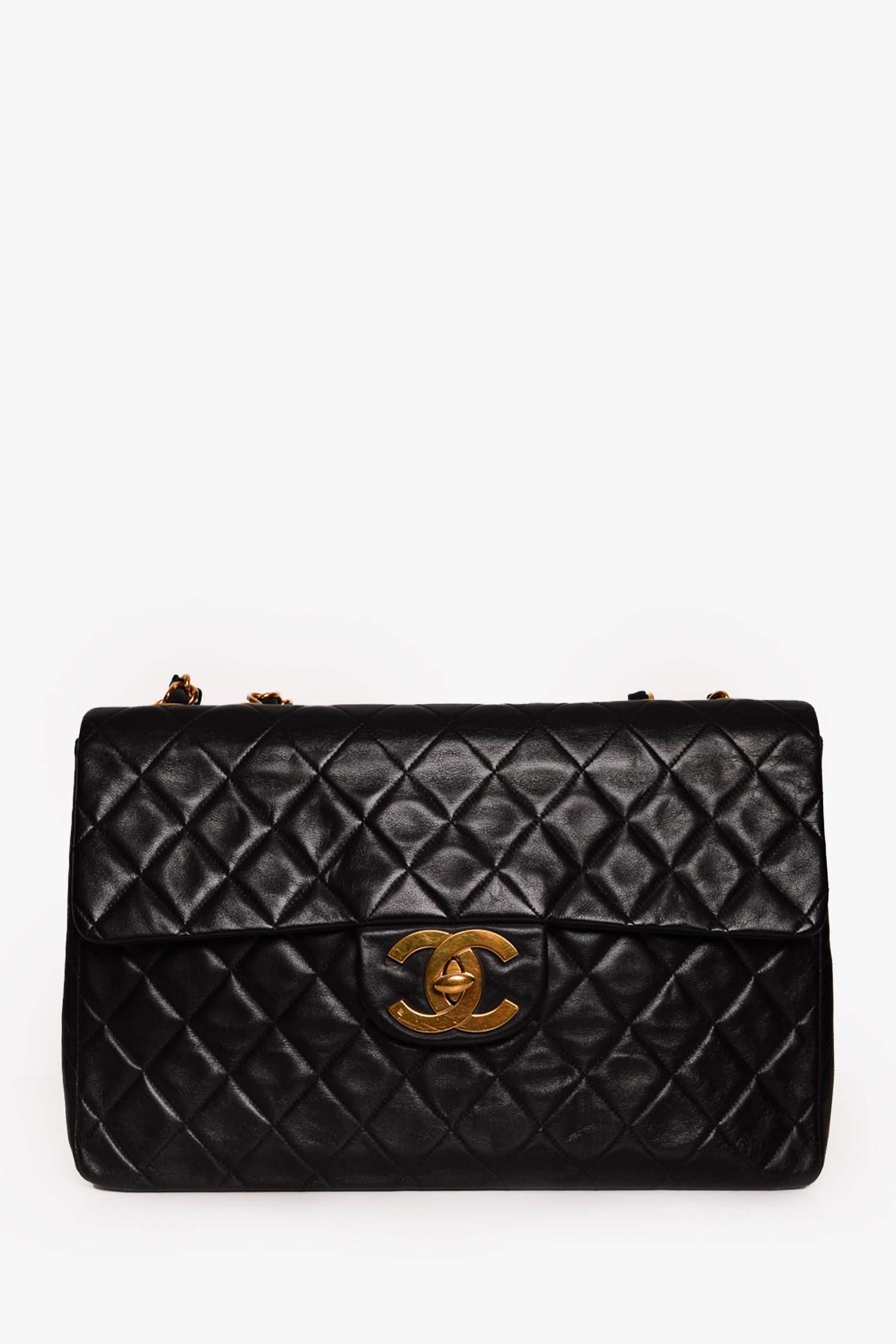 Pre-Loved Chanel™ Black Lambskin Jumbo XL Maxi Flap