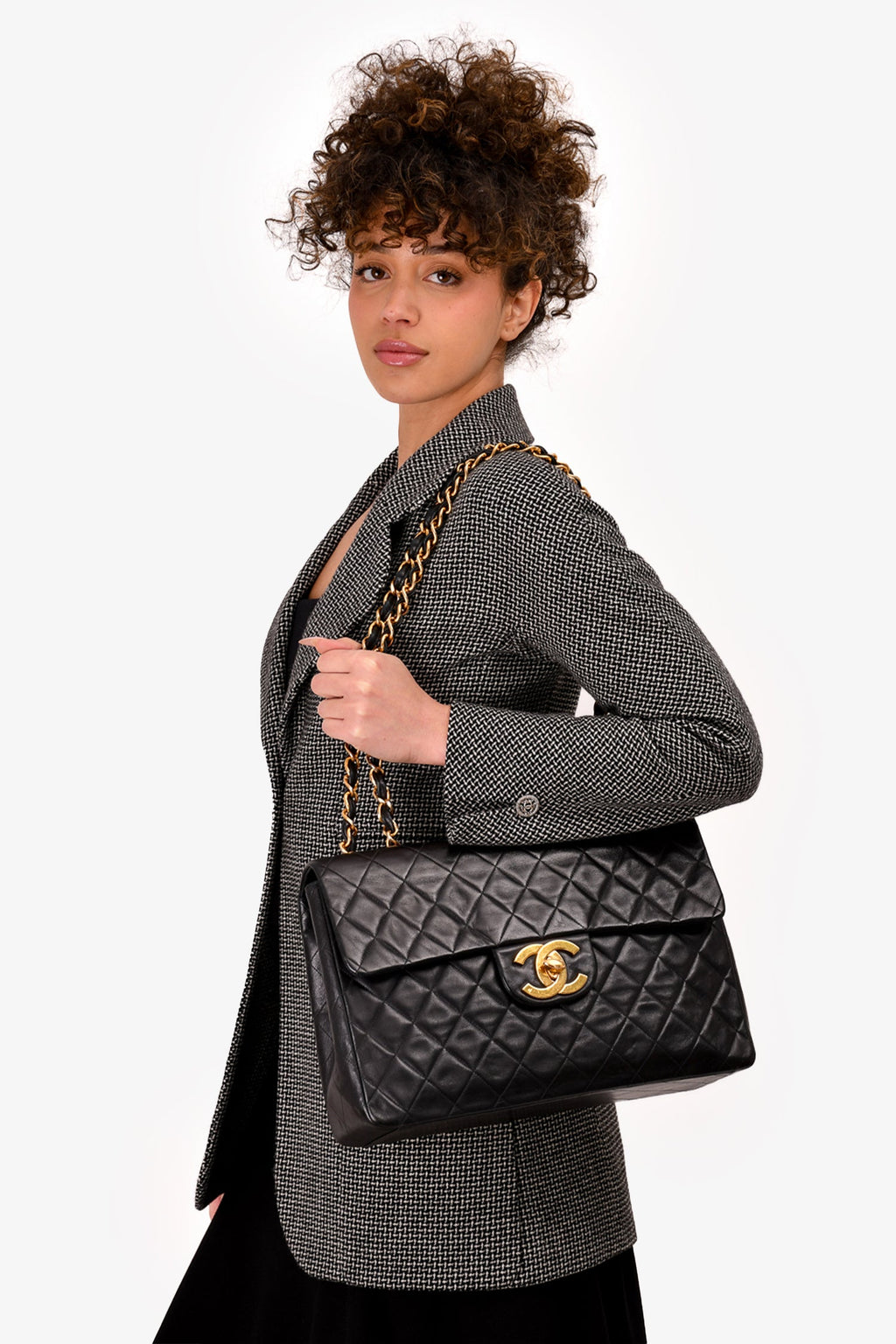 Pre-Loved Chanel™ Black Lambskin Jumbo XL Maxi Flap