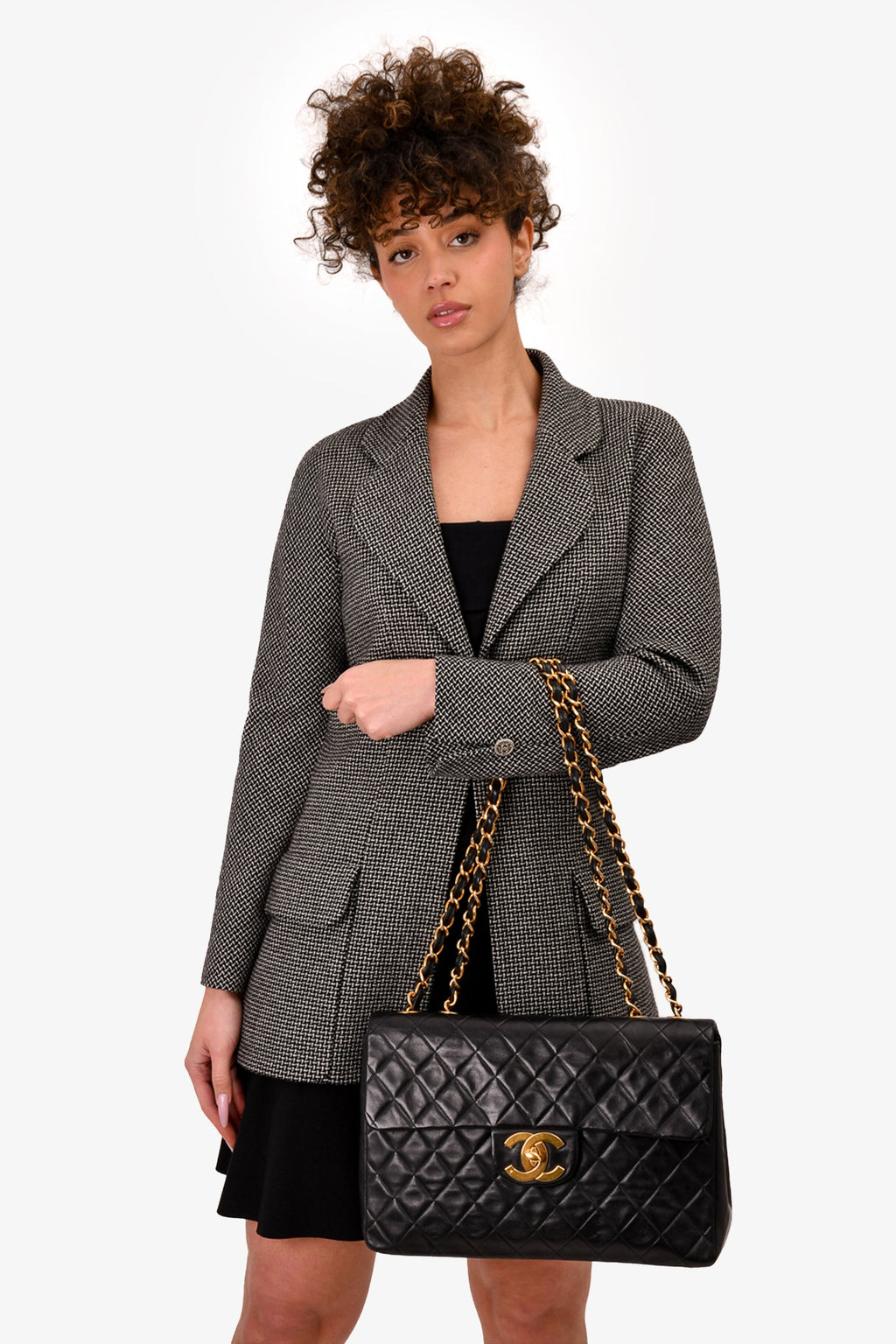 Pre-Loved Chanel™ Black Lambskin Jumbo XL Maxi Flap