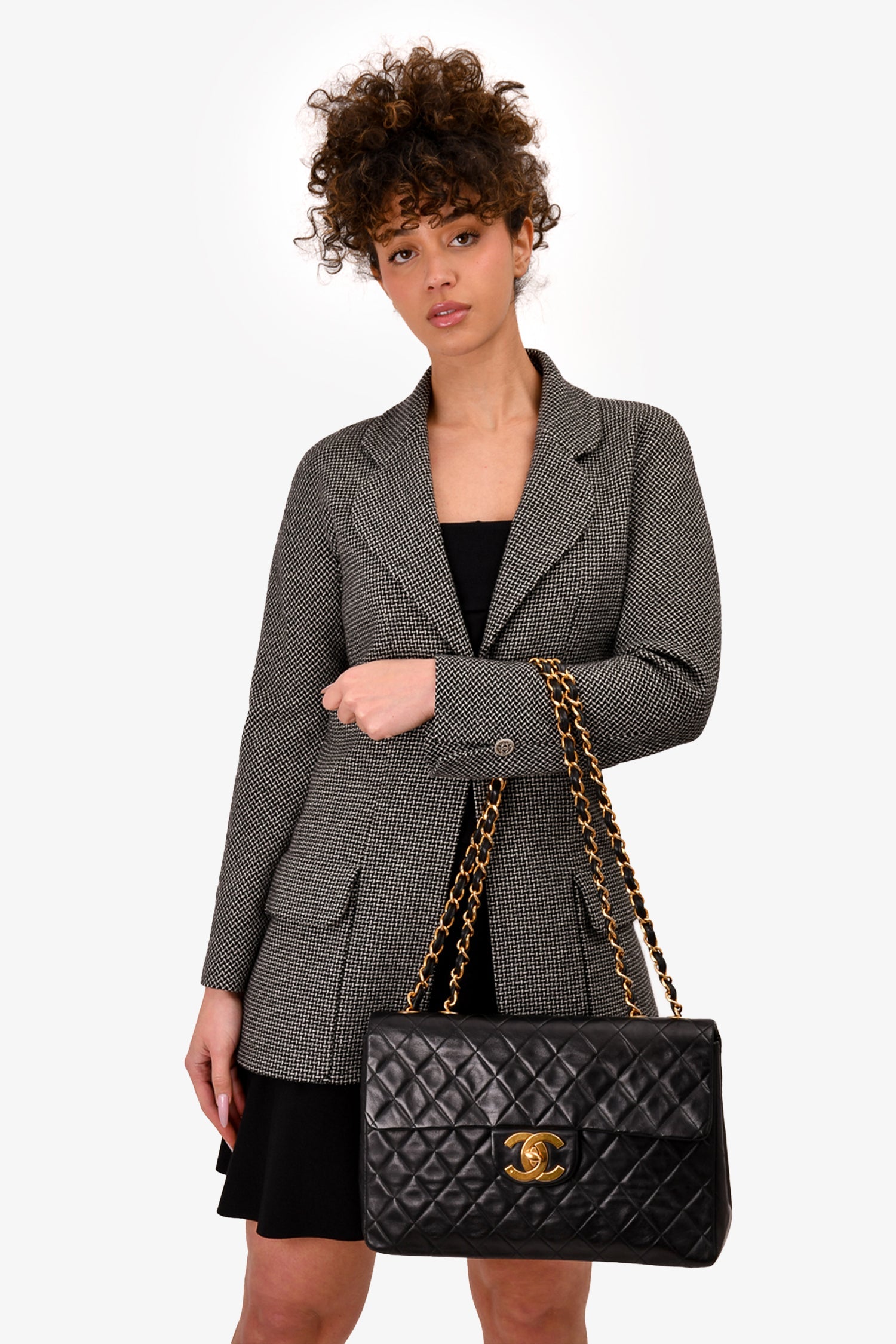 Pre-Loved Chanel™ Black Lambskin Jumbo XL Maxi Flap