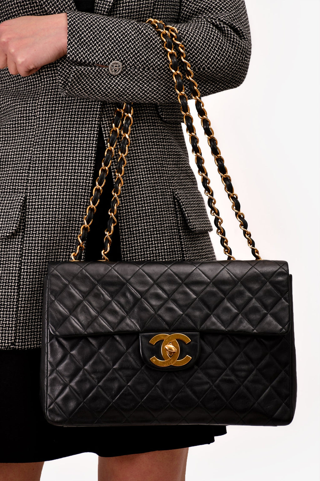 Pre-Loved Chanel™ Black Lambskin Jumbo XL Maxi Flap