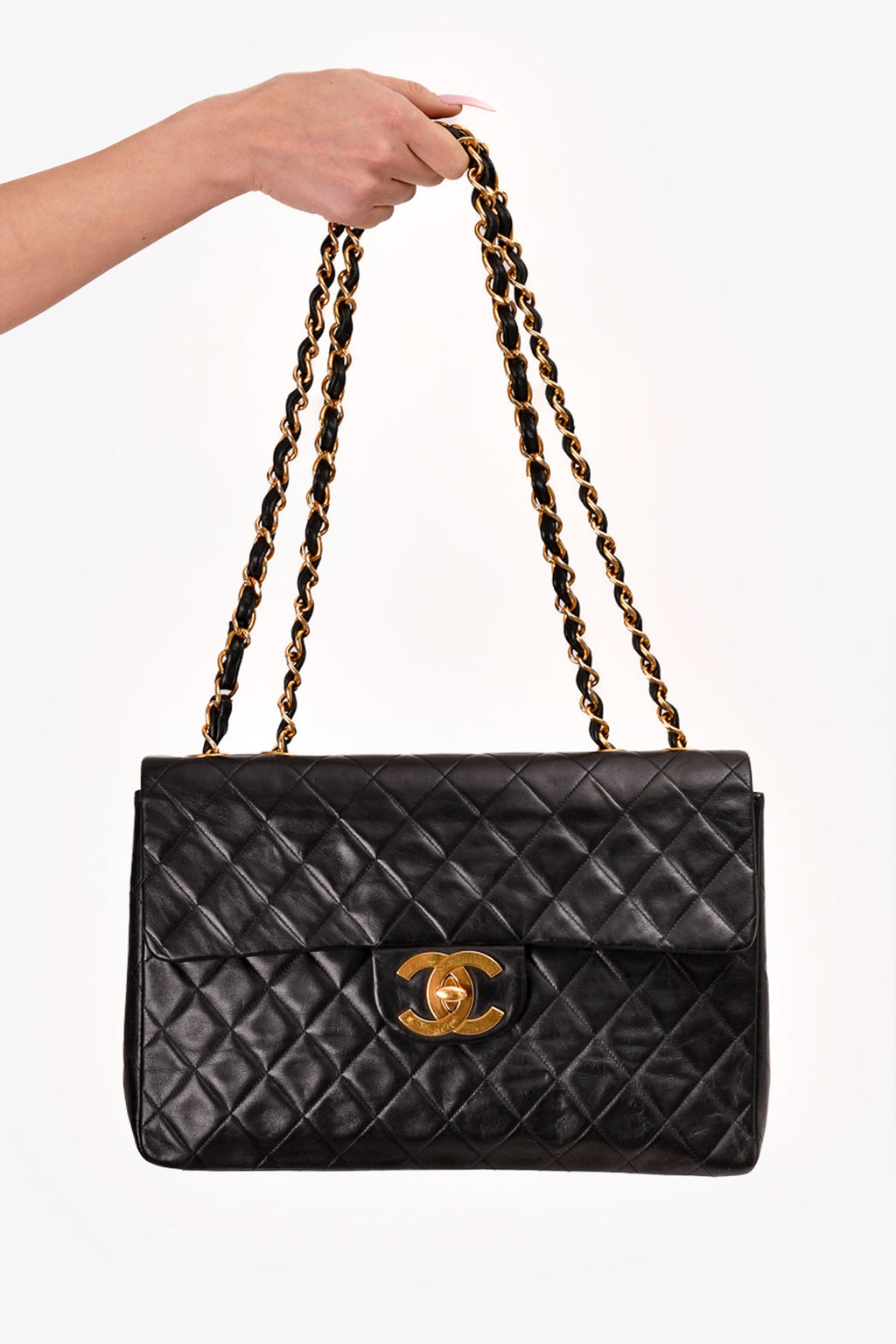 Pre-Loved Chanel™ Black Lambskin Jumbo XL Maxi Flap