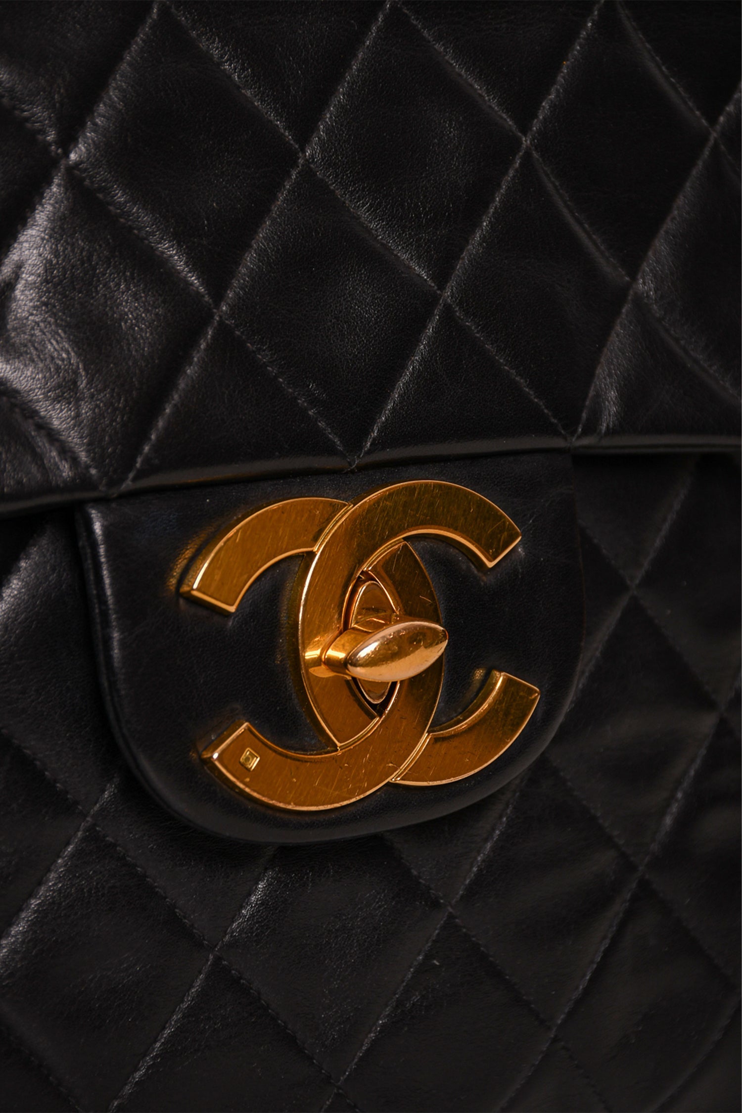 Pre-Loved Chanel™ Black Lambskin Jumbo XL Maxi Flap
