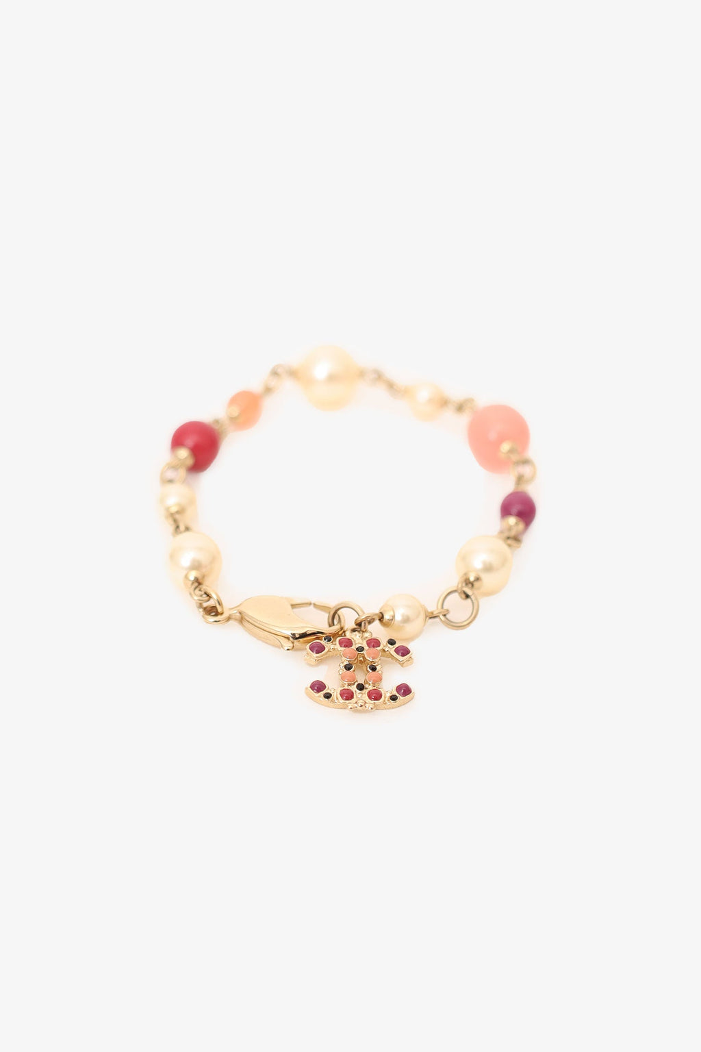 Pre-Loved Chanel™  Gold Tone Pink Beaded CC Charm Bracelet