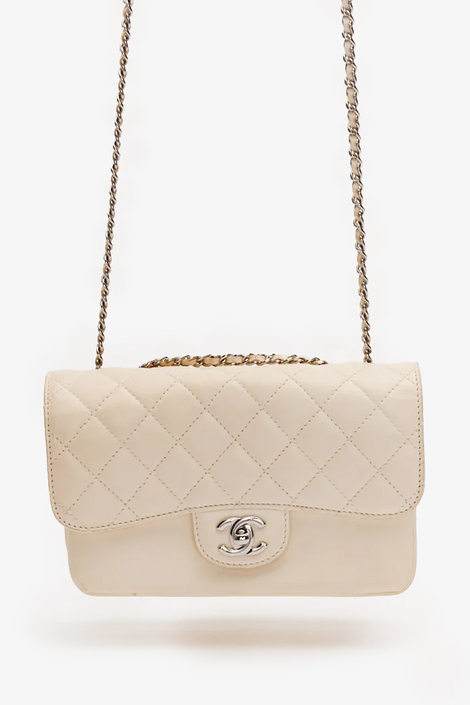 Pre-Loved Chanel™ Cream Lambskin Timeless Bag