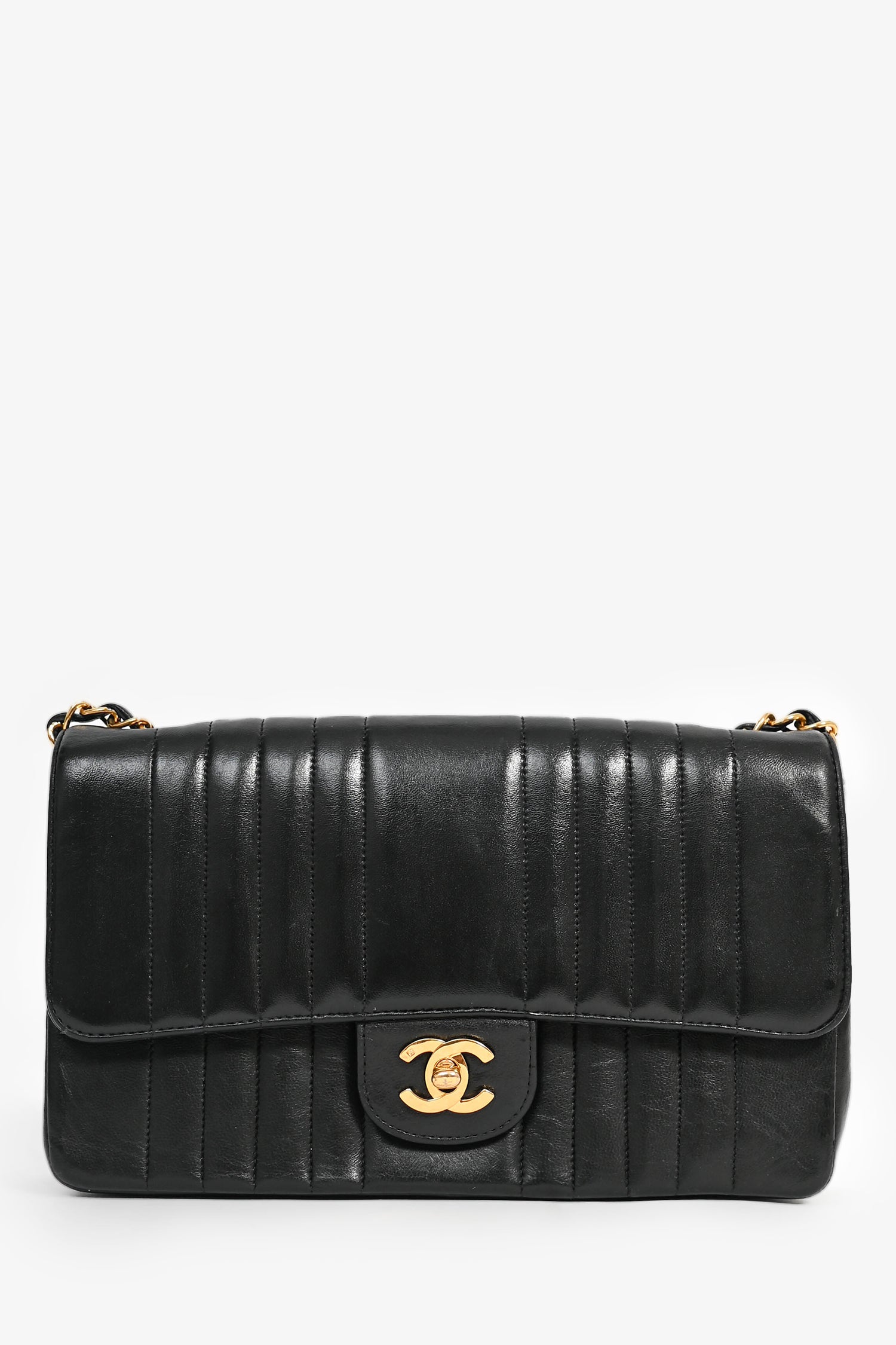 Pre-Loved Chanel™ 1991-94 Vintage Black Vertical Quilted Lambskin Medium CC Flap Bag
