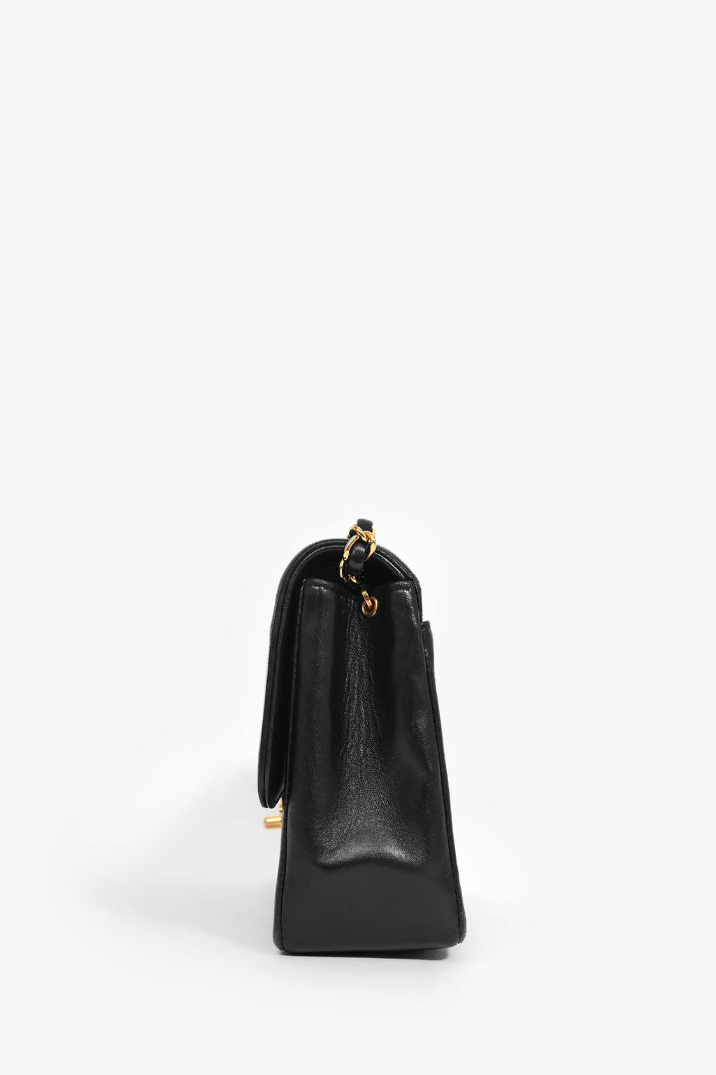 Pre-Loved Chanel™ 1991-94 Vintage Black Vertical Quilted Lambskin Medium CC Flap Bag