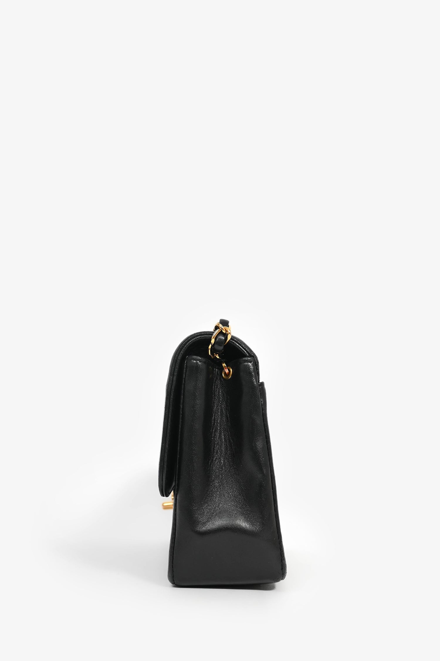 Pre-Loved Chanel™ 1991-94 Vintage Black Vertical Quilted Lambskin Medium CC Flap Bag