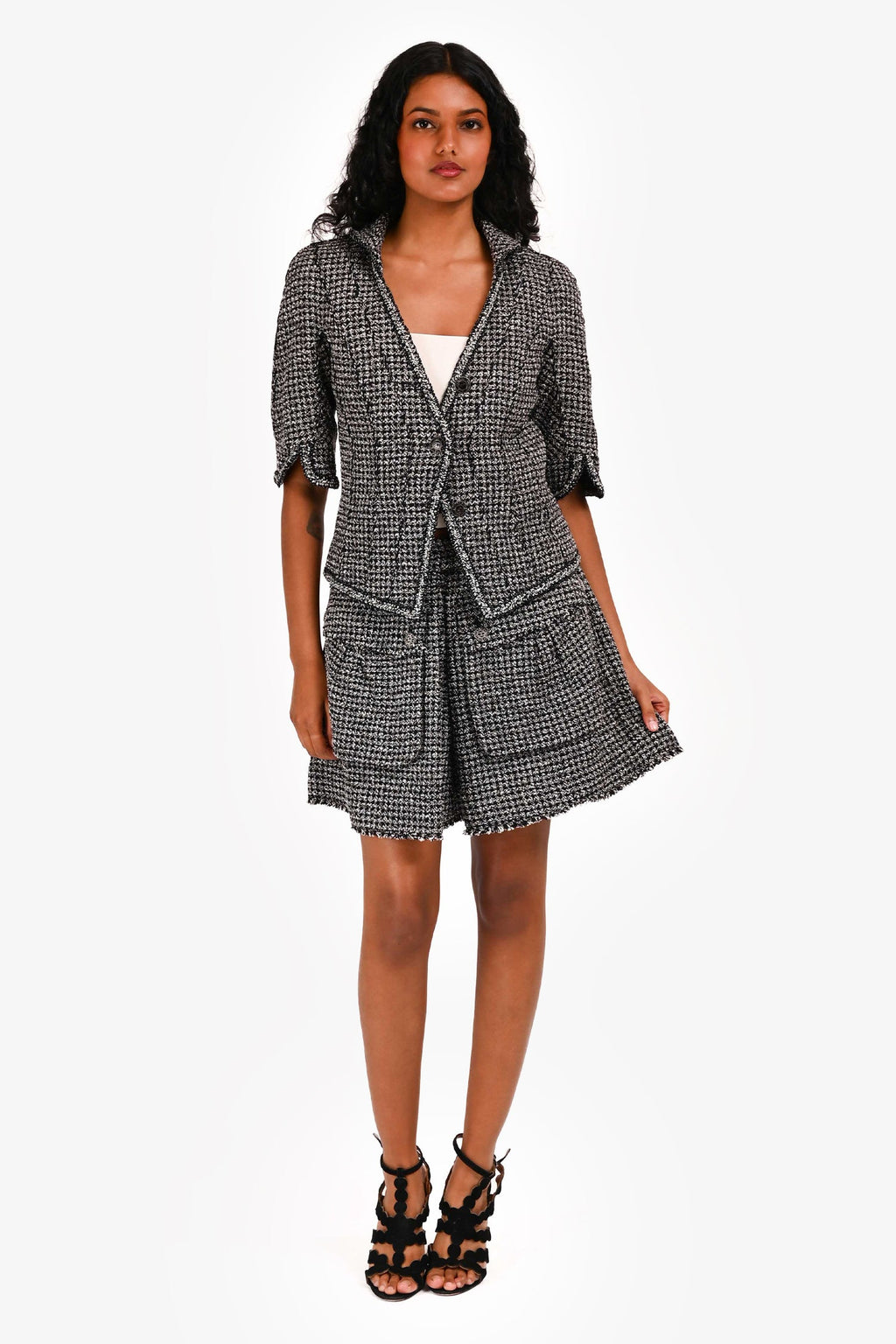 Pre-Loved Chanel™ 2010 Black/White Short Sleeves Tweed Jacket + Skirt Sets Size 38