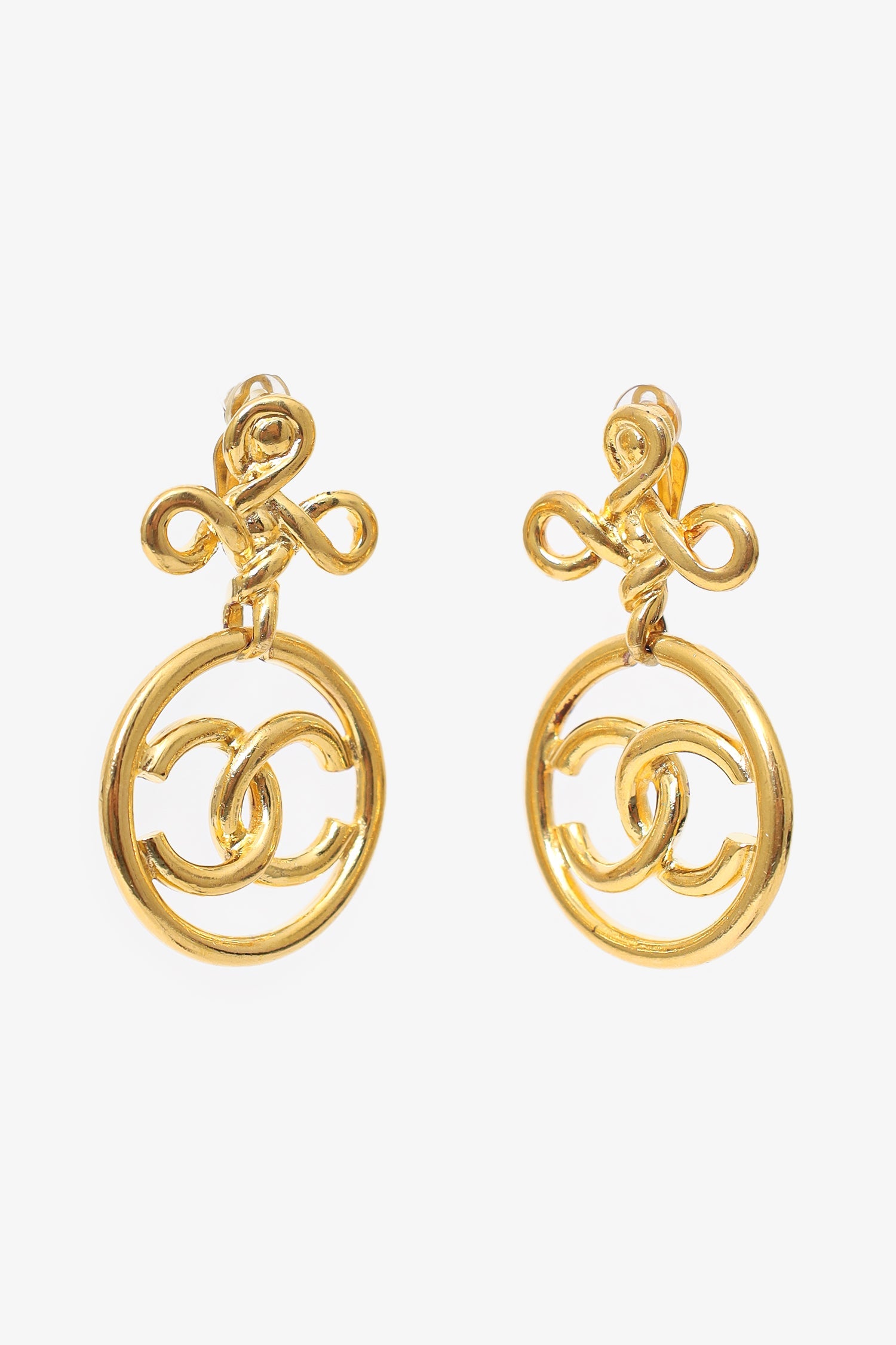 Pre-Loved Chanel™ 1993 Gold Tone Knot CC Drop Earrings