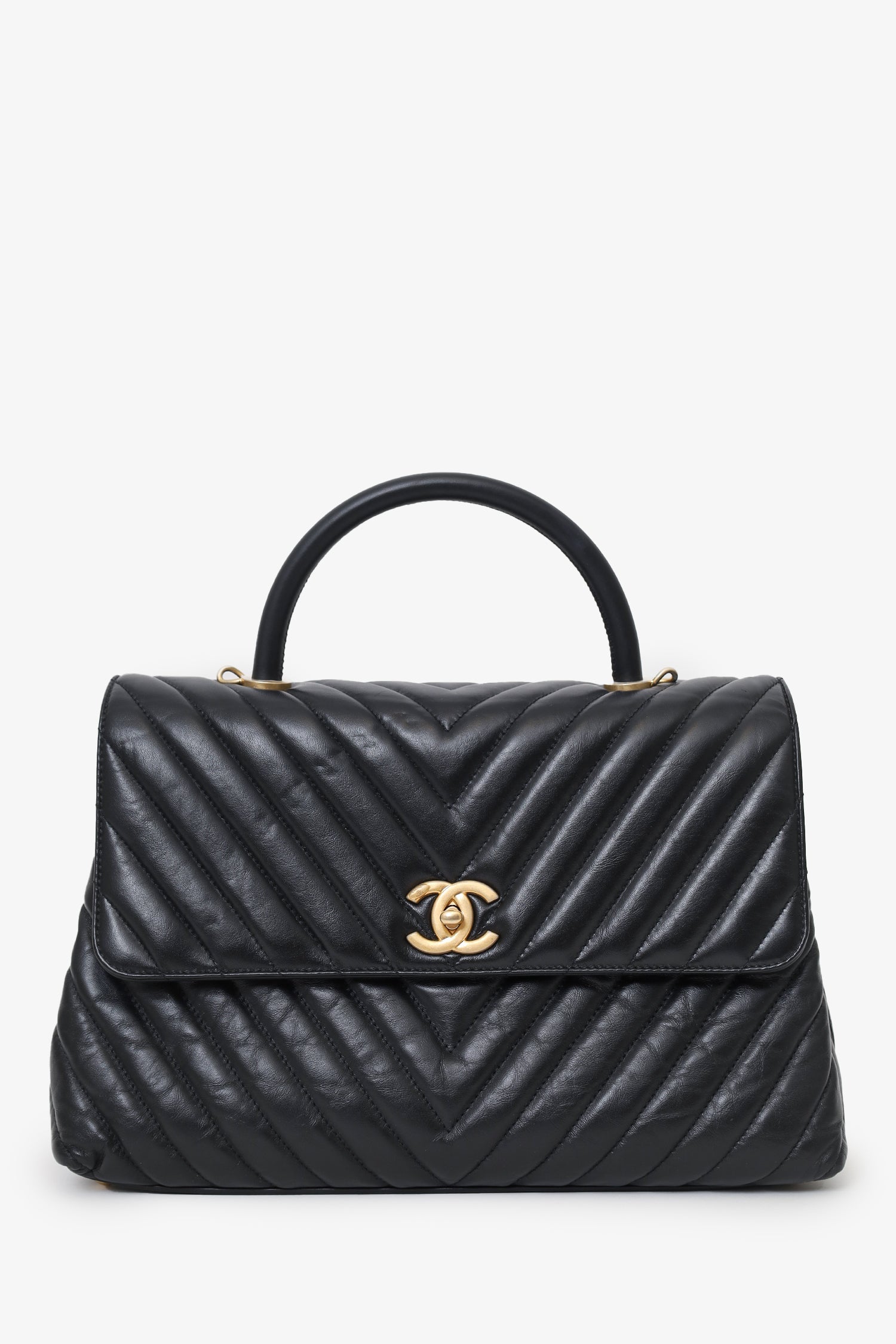 Pre-Loved Chanel™ Black Leather Chevron Coco Top Handle With Strap