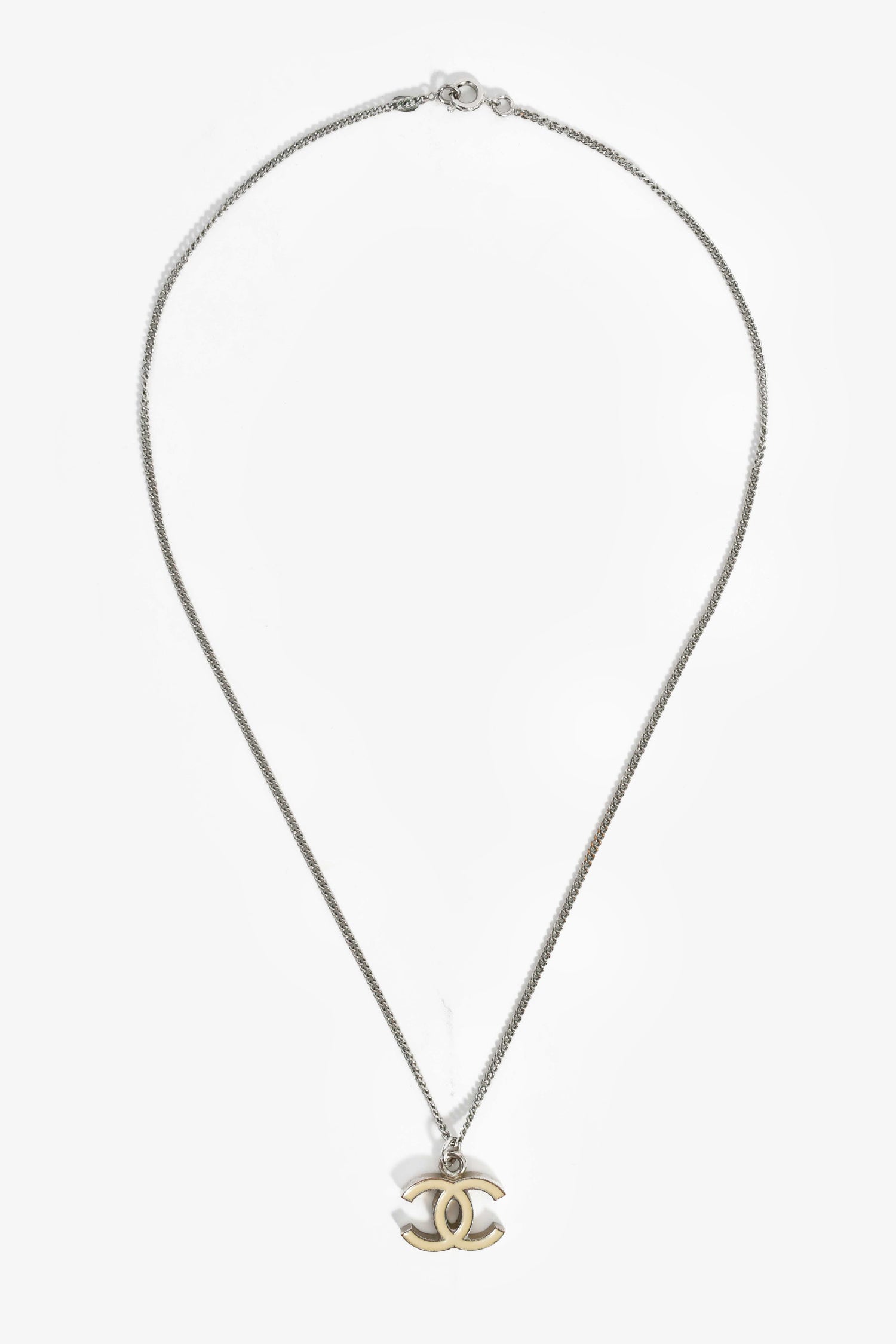 Pre-Loved Chanel™ Silver Toned Cream CC Pendant Necklace