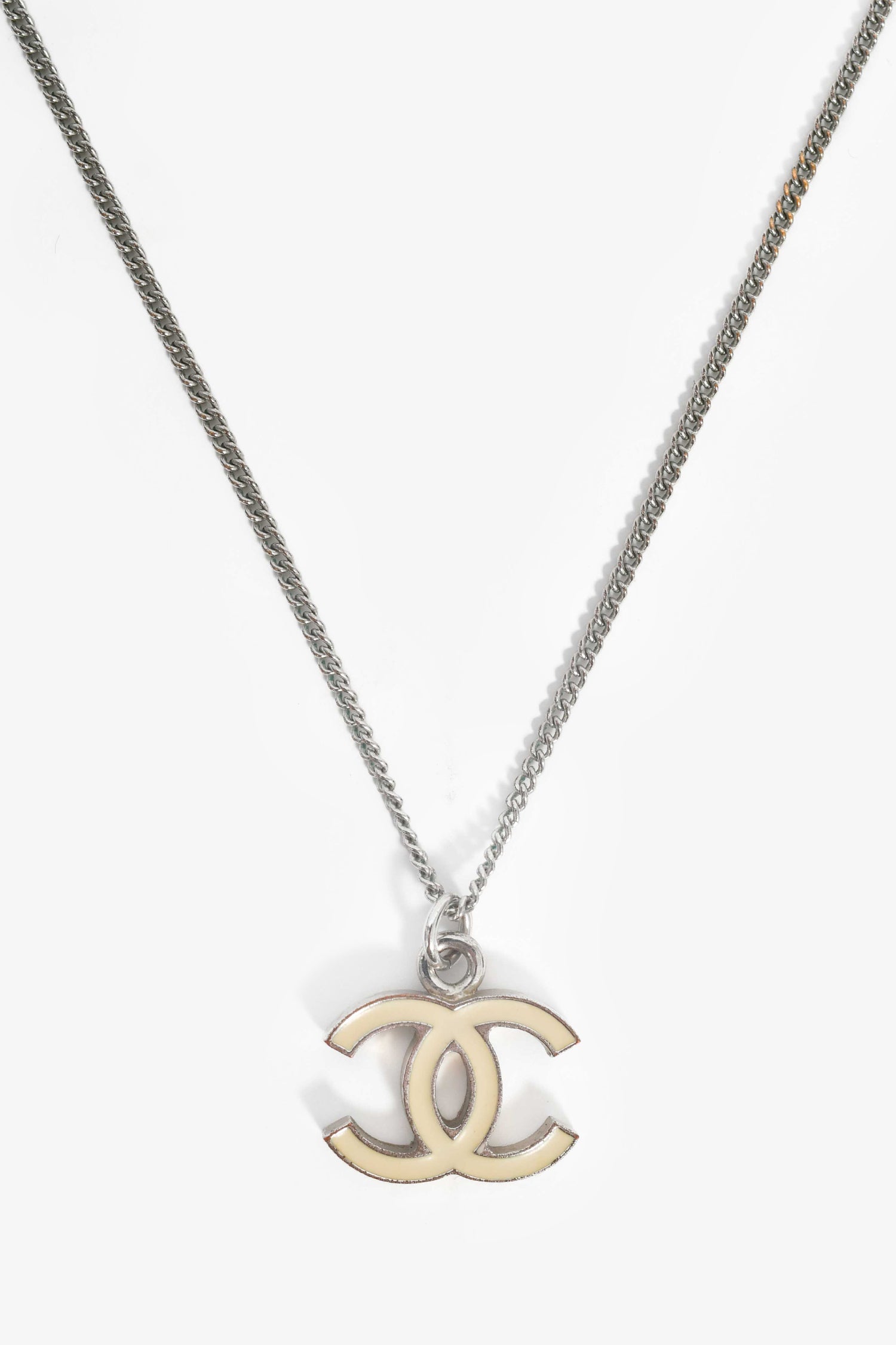 Pre-Loved Chanel™ Silver Toned Cream CC Pendant Necklace