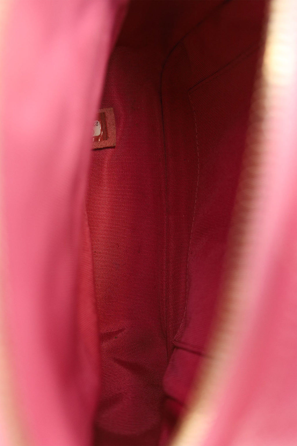 Pre-Loved Chanel™ 2019 Hot Pink Caviar Leather Mini Chain Backpack
