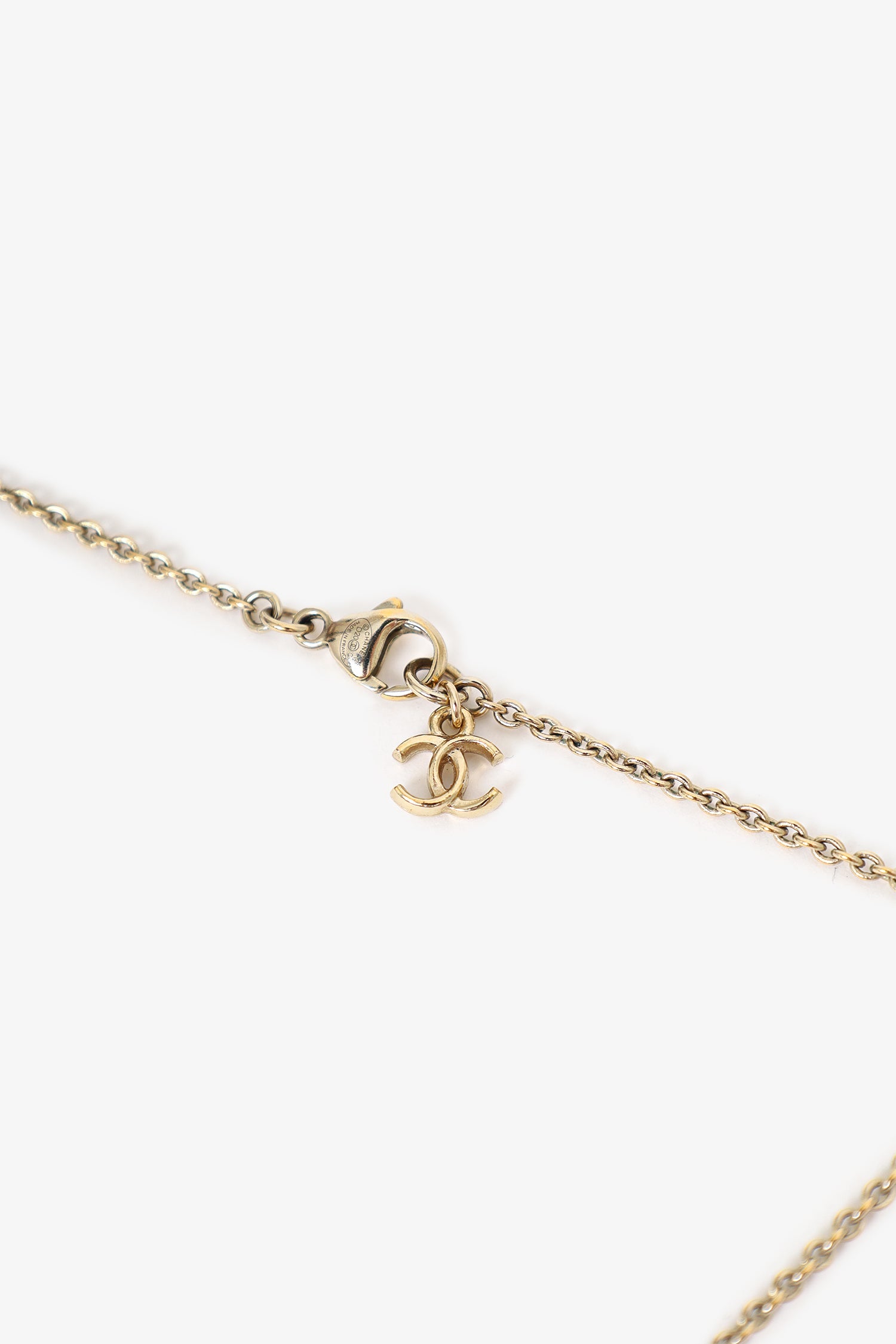Pre-Loved Chanel™ Black Plastic Coco Chanel Pearl Tag Necklace