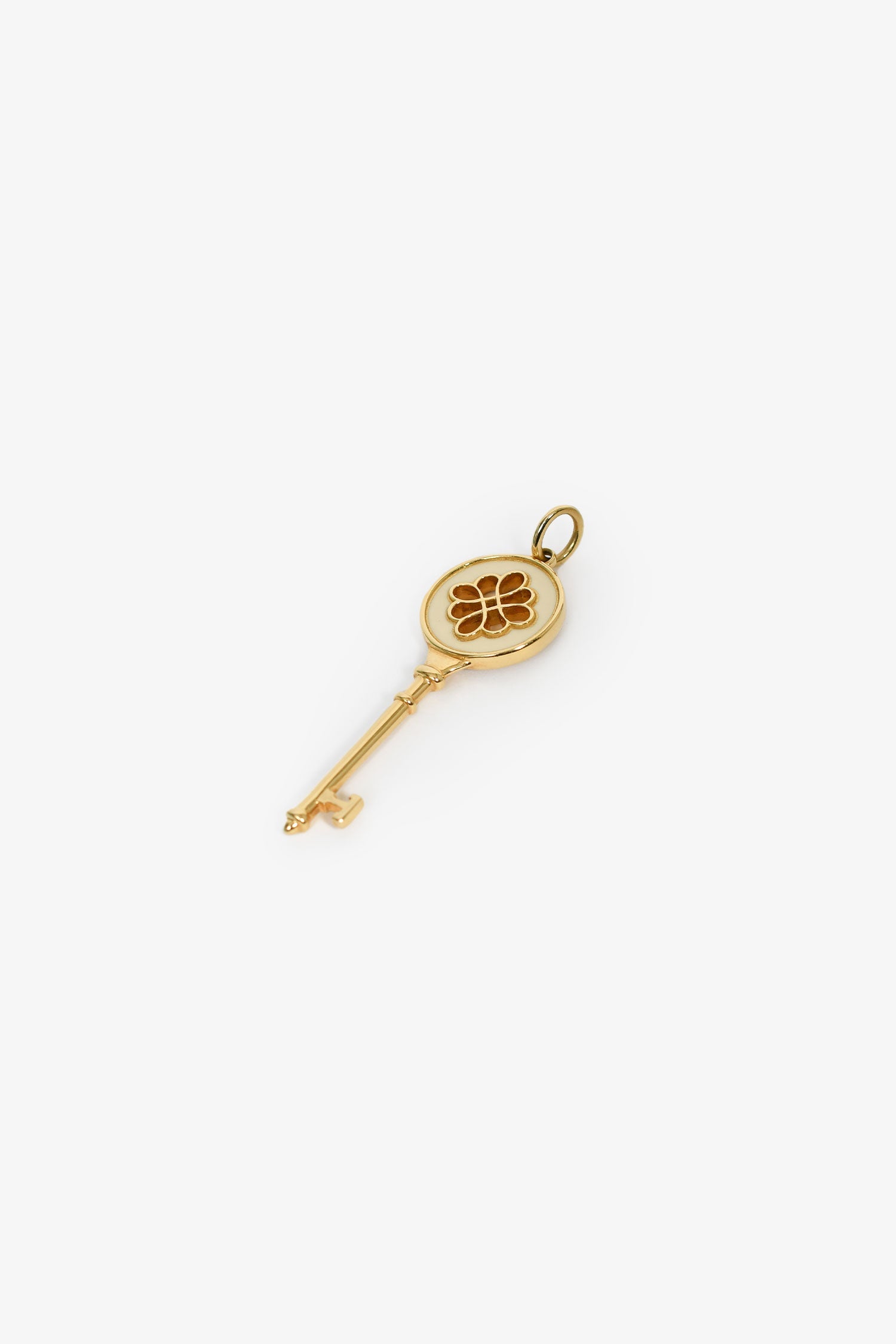 Tiffany & Co. 18K Yellow Gold White Enamel Knot Key Pendant