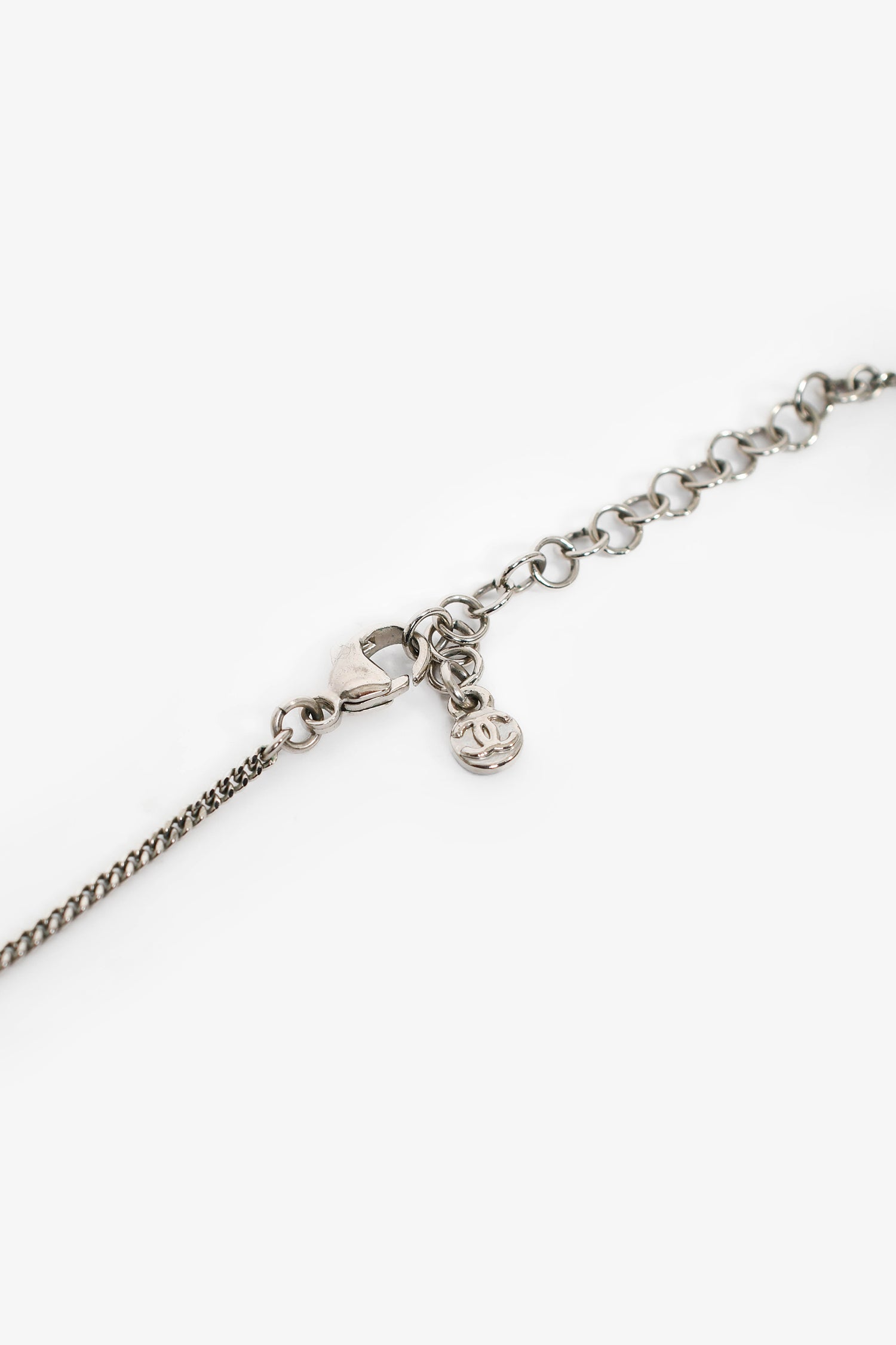 Pre-Loved Chanel™ 2012 Silver Toned Crystal Drop CC Pendant Necklace