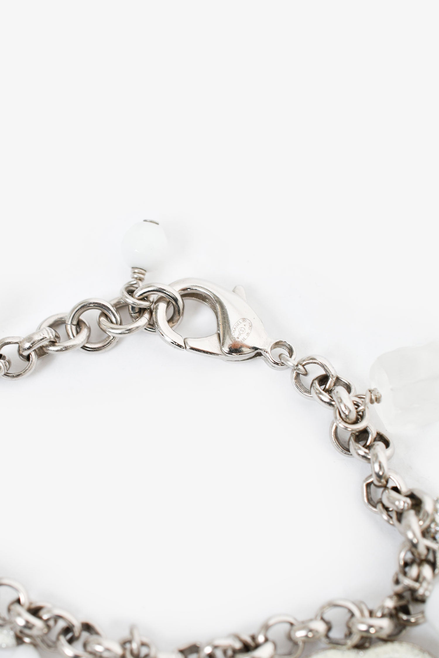 Pre-Loved Chanel™ 2010 Silver Tone/White Enamel CC Charm Bracelet