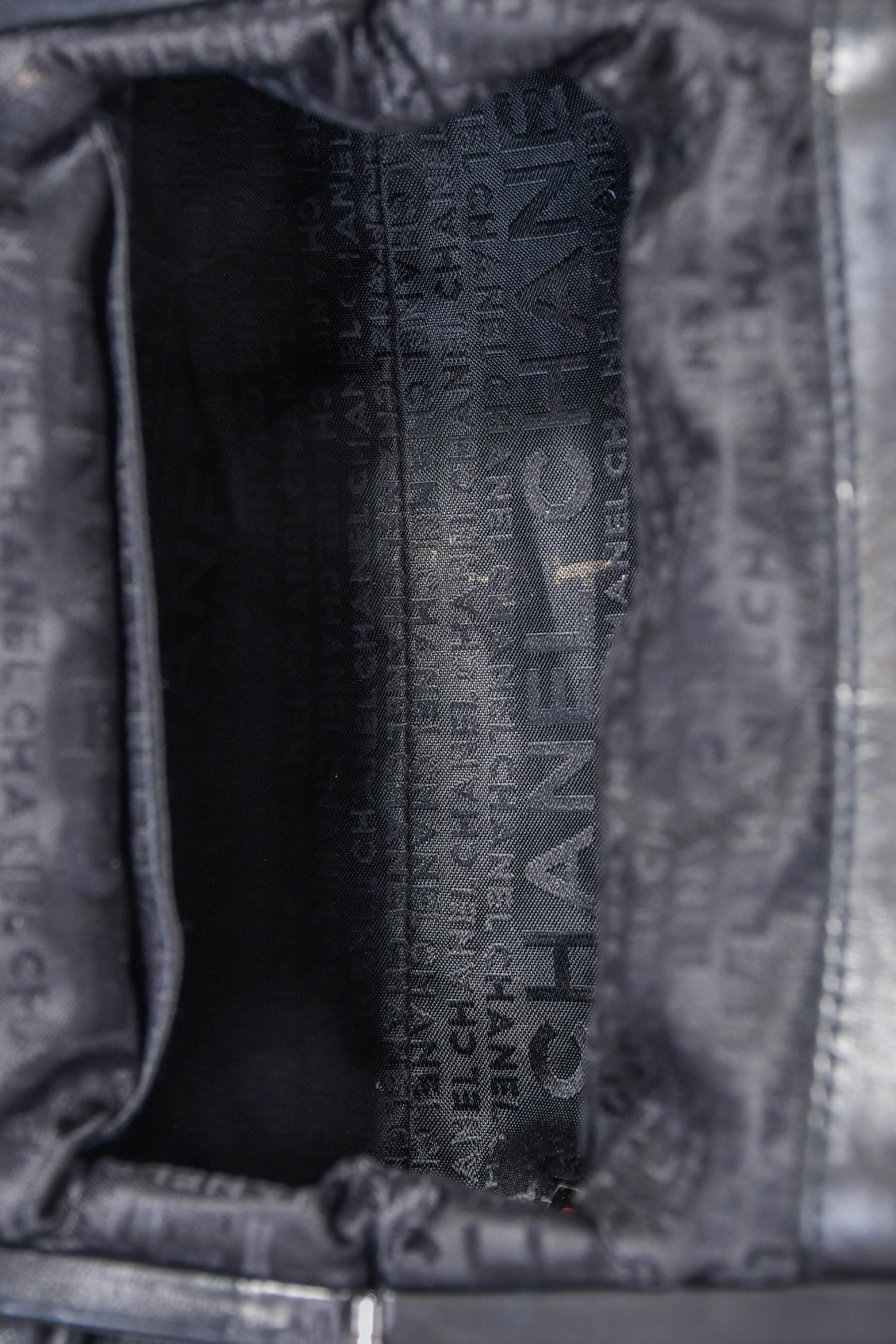 Pre-Loved Chanel™ Vintage Black Leather Camellia Frame Clutch Bag