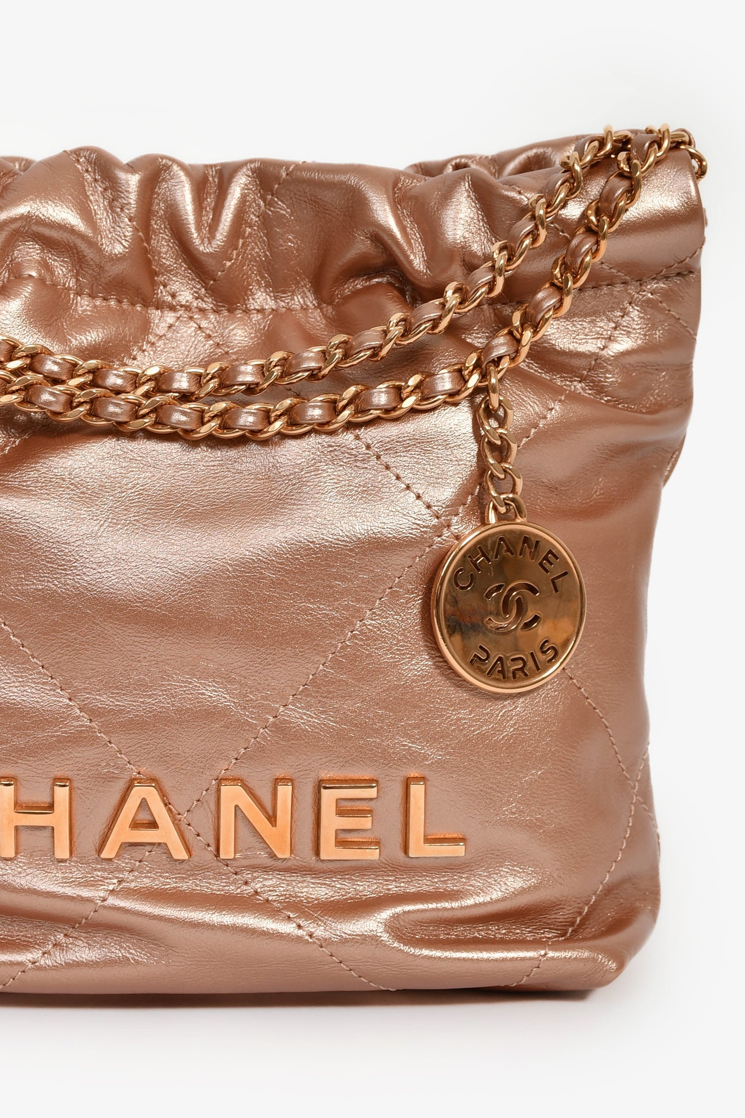 Pre-Loved Chanel™ 2021+ Rose Metallic Quilted Calfskin Mini Chanel 22 Hobo Bag