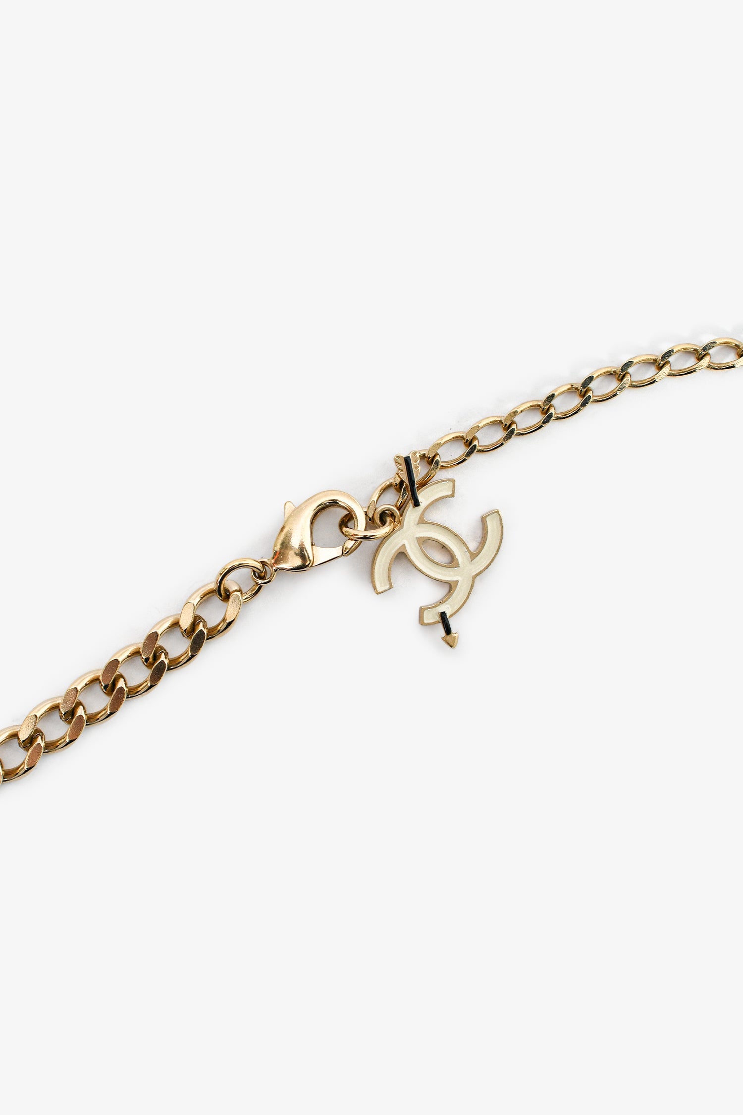 Pre-Loved Chanel™ 2010 Gold Toned Black/White/Red Enamel 'Coco Rider' Charm Chain Belt