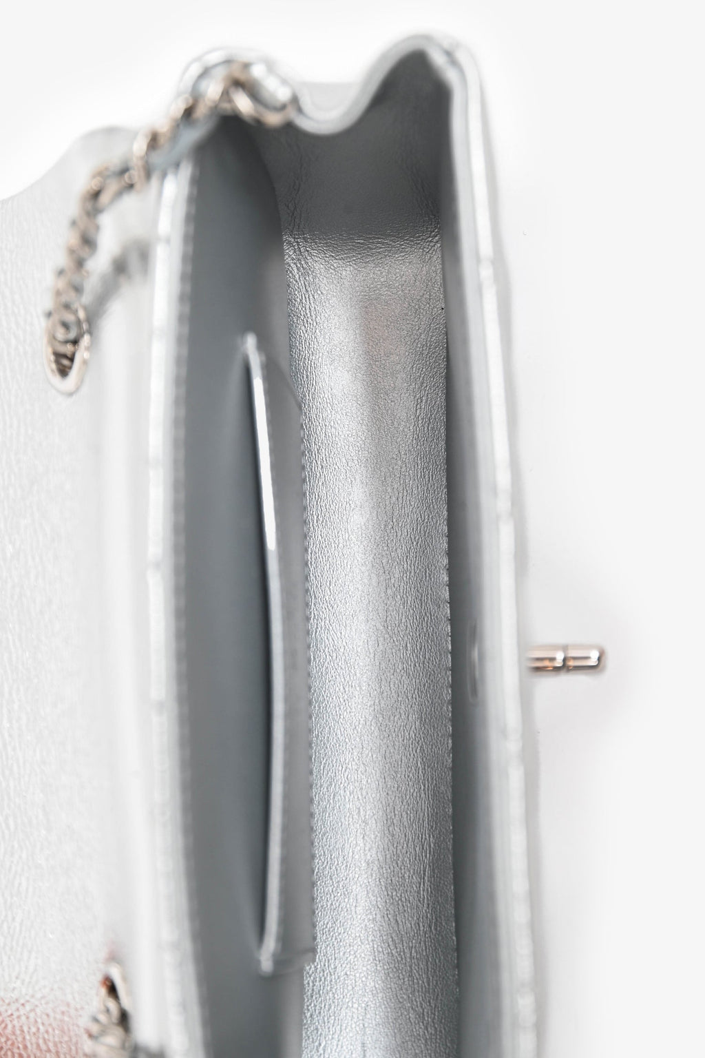 Pre-Loved Chanel™ 2025 Silver Leather Quilted 'O' Phone Holder with Chain