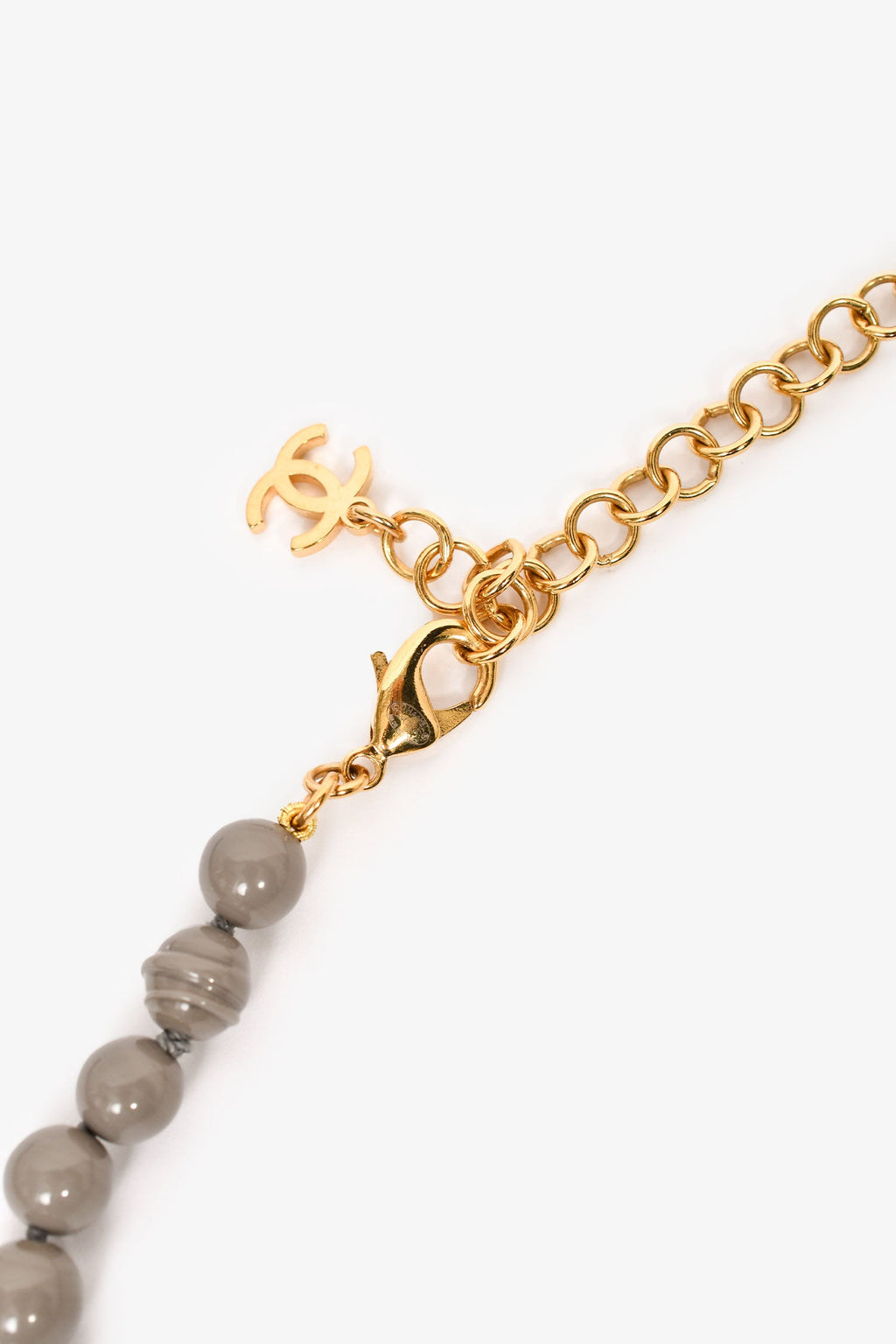 Pre-Loved Chanel™ 2024 Grey Gold Tone Faux Pearls/Strass CC Logo Long Necklace