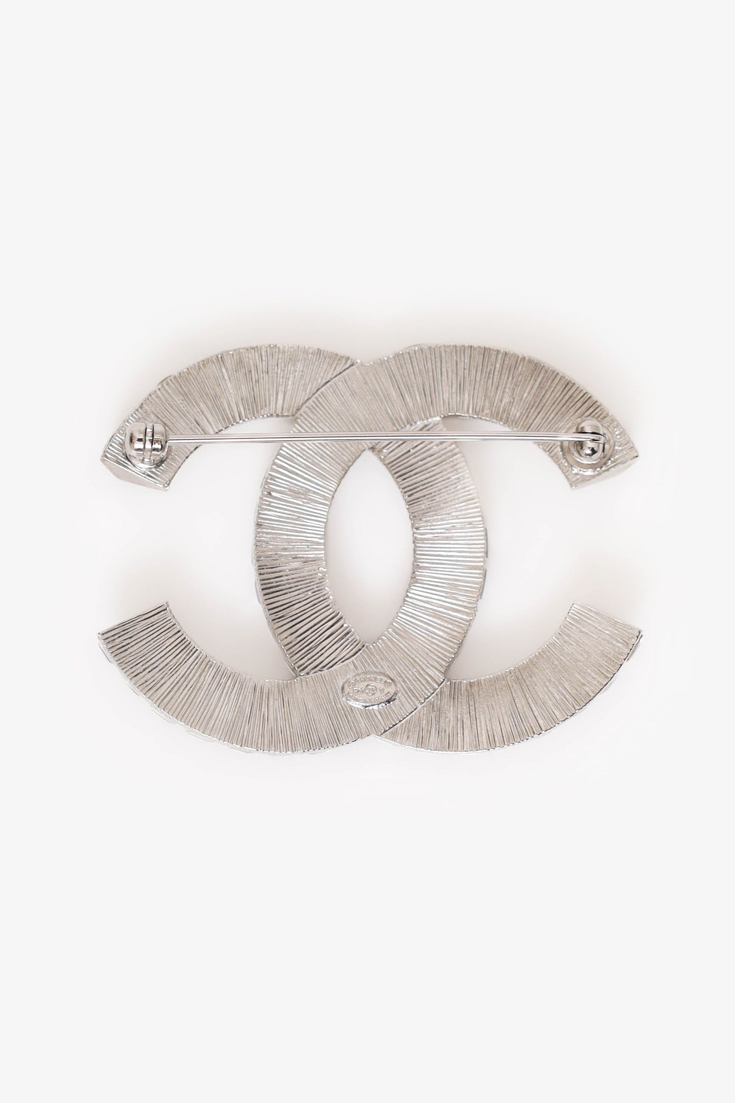Pre-Loved Chanel™ Silver Tone Crystal Embellished CC Brooch