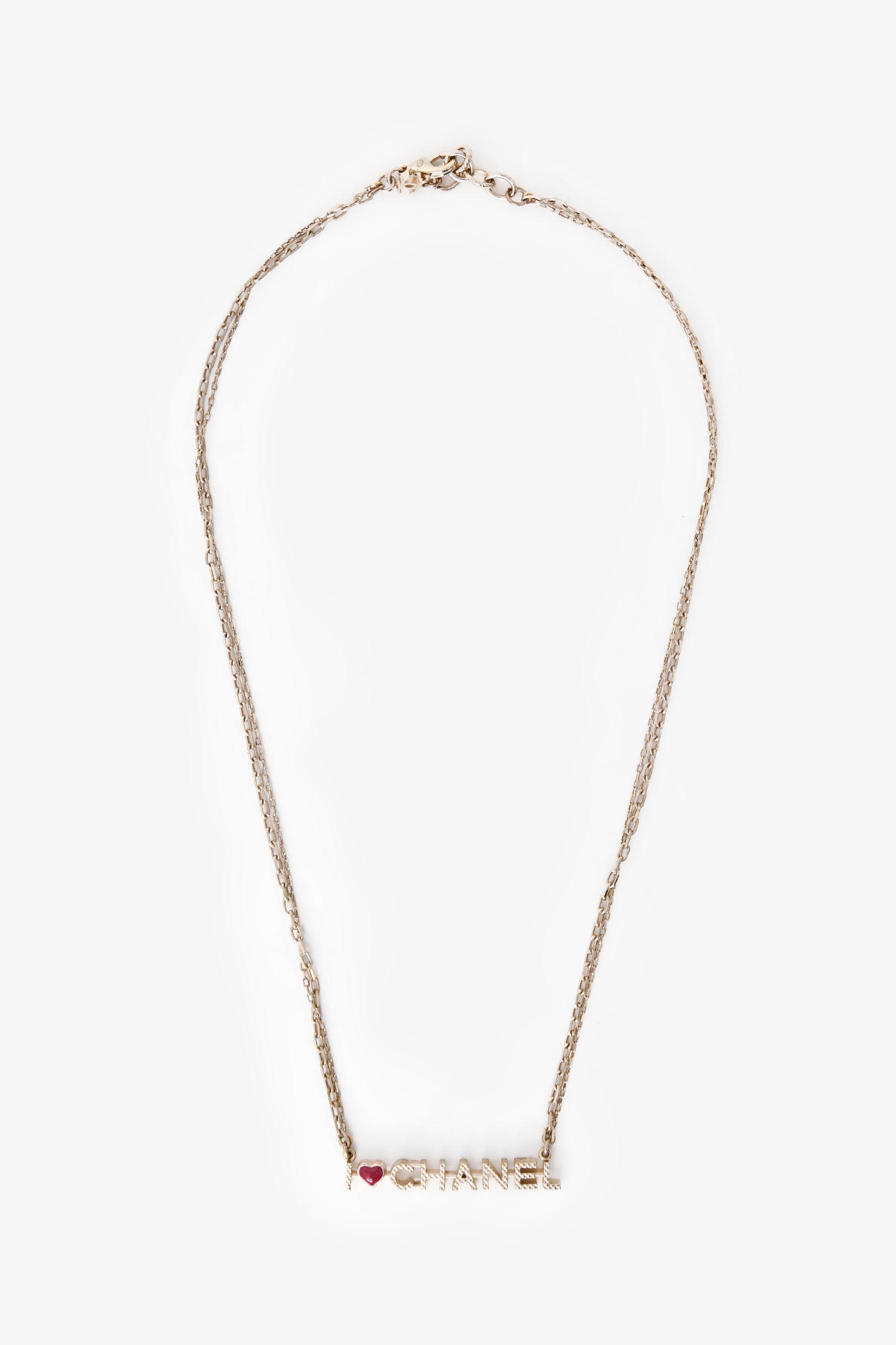 Pre-Loved Chanel™ 2017 Gold Tone Metal Heart Logo Necklace