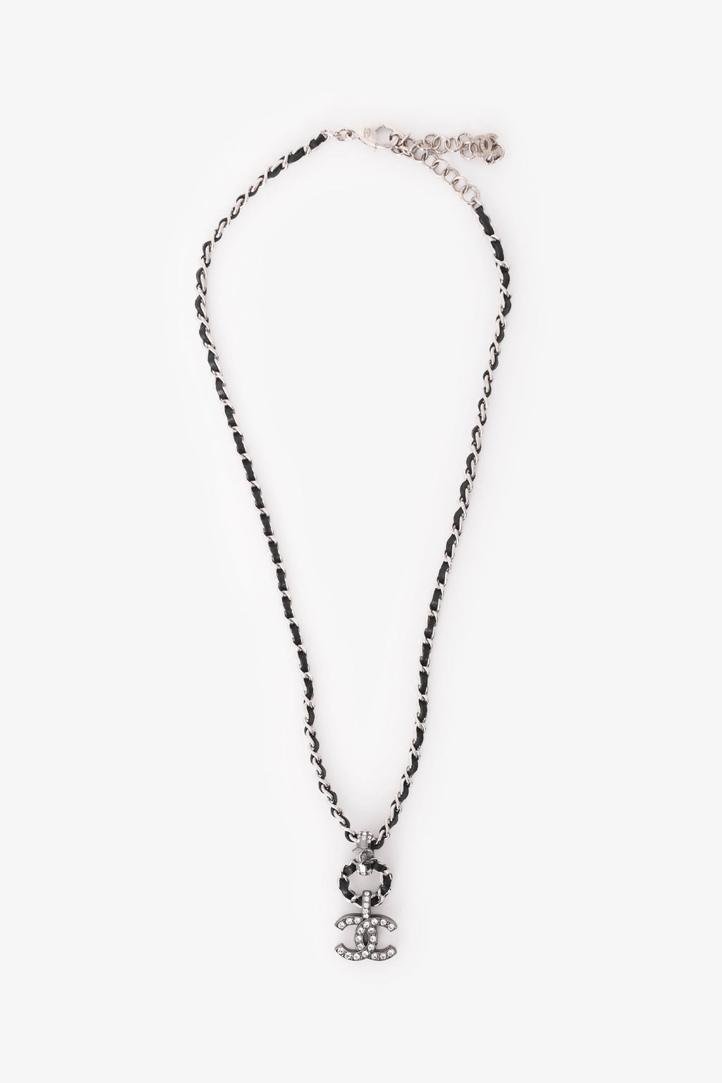 Pre-Loved Chanel™ 2021 Silver Tone Metal/ Leather Intertwined CC Crystal Embellished Necklace