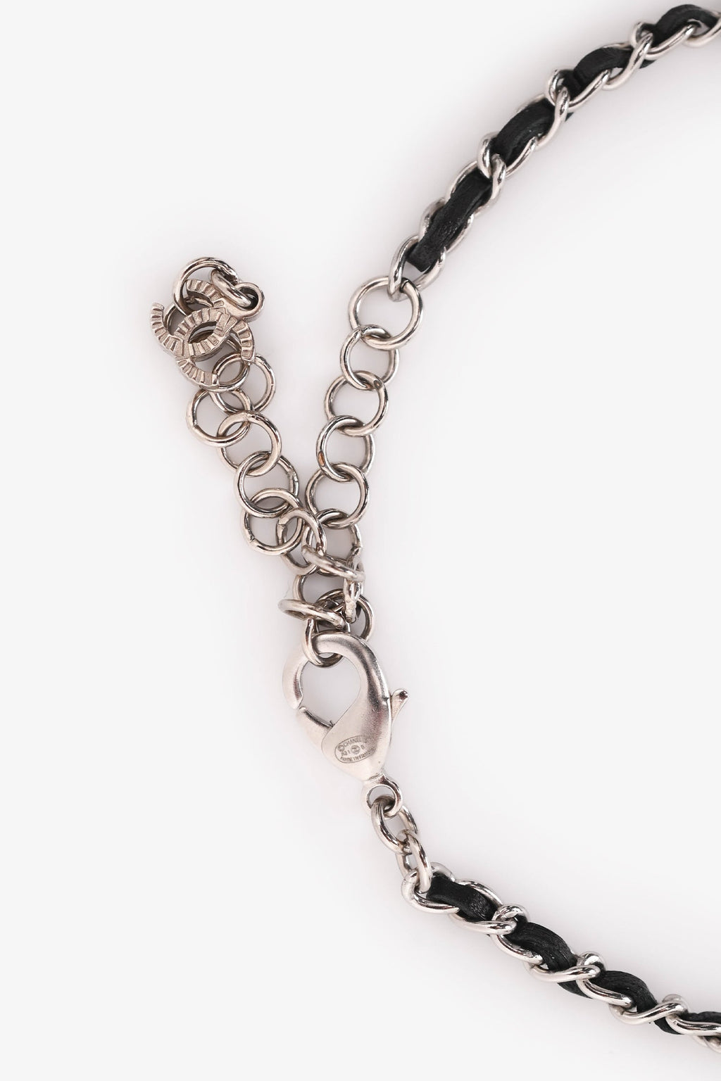 Pre-Loved Chanel™ 2021 Silver Tone Metal/ Leather Intertwined CC Crystal Embellished Necklace