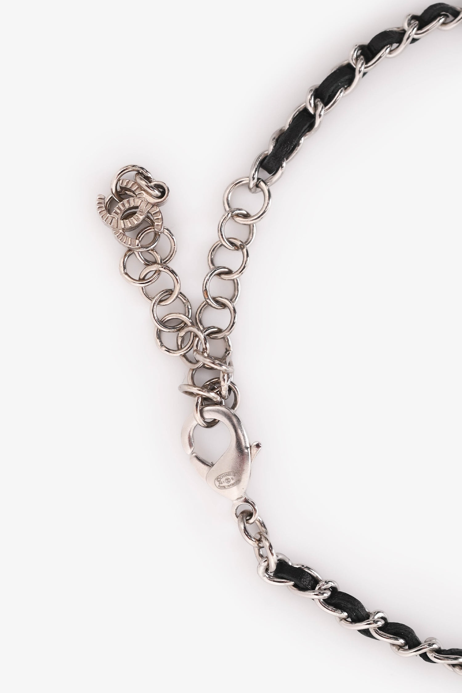 Pre-Loved Chanel™ 2021 Silver Tone Metal/ Leather Intertwined CC Crystal Embellished Necklace