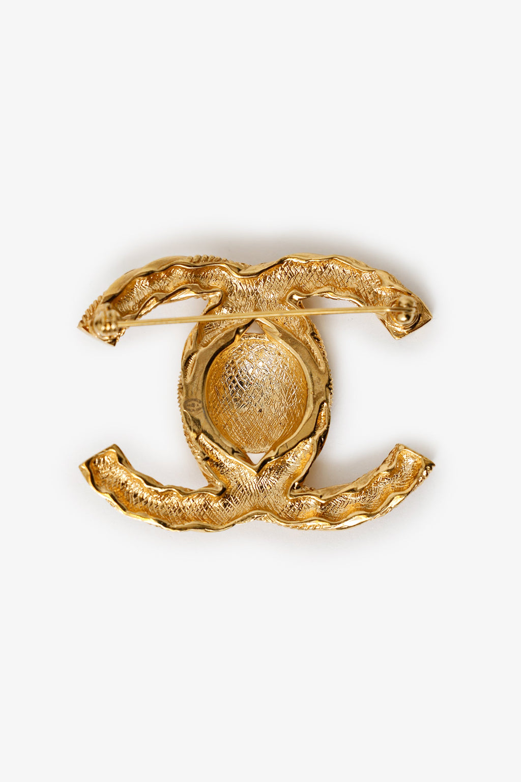 Pre-Loved Chanel™ Gold Tone Twisted CC Brooch