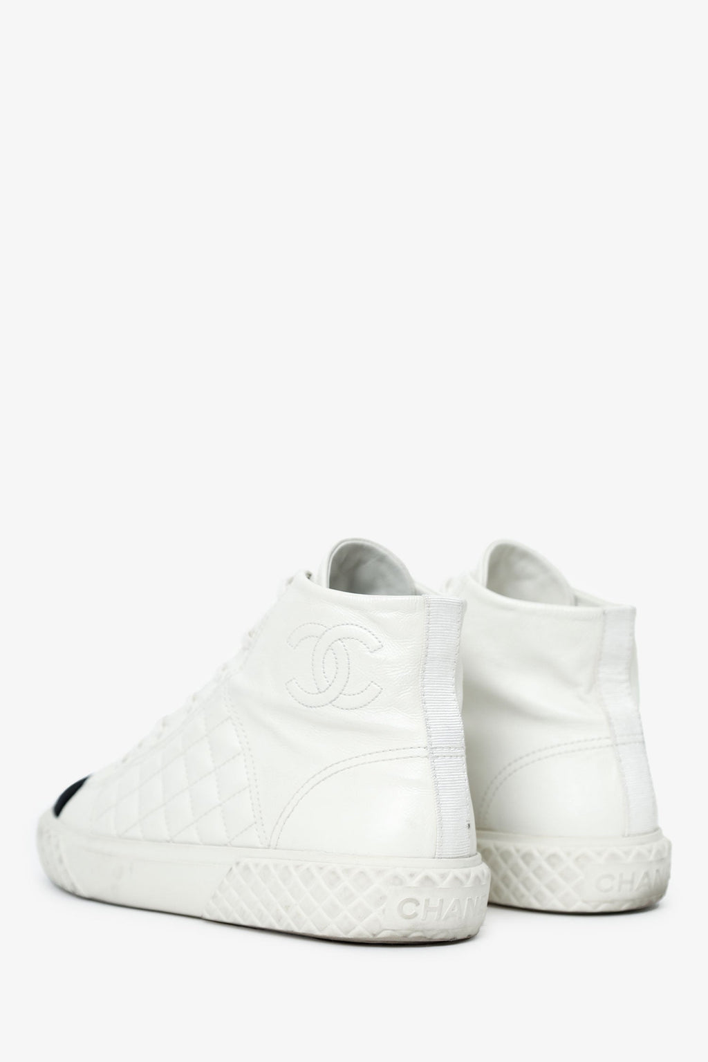 Pre-Loved Chanel™ White Quilted Leather CC Cap Toe High Top Sneaker Size 40