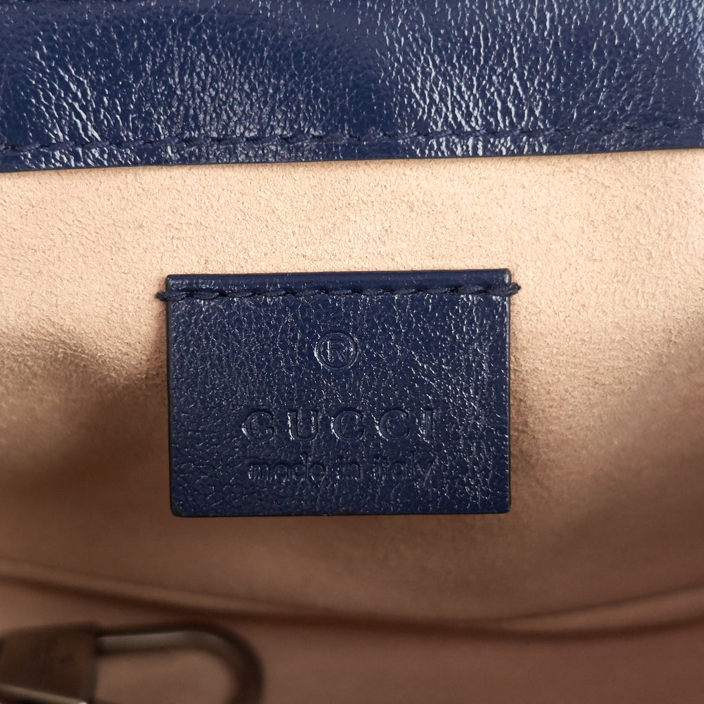 Gucci GG Marmont Diagonal Torchon Super Mini Leather Bag