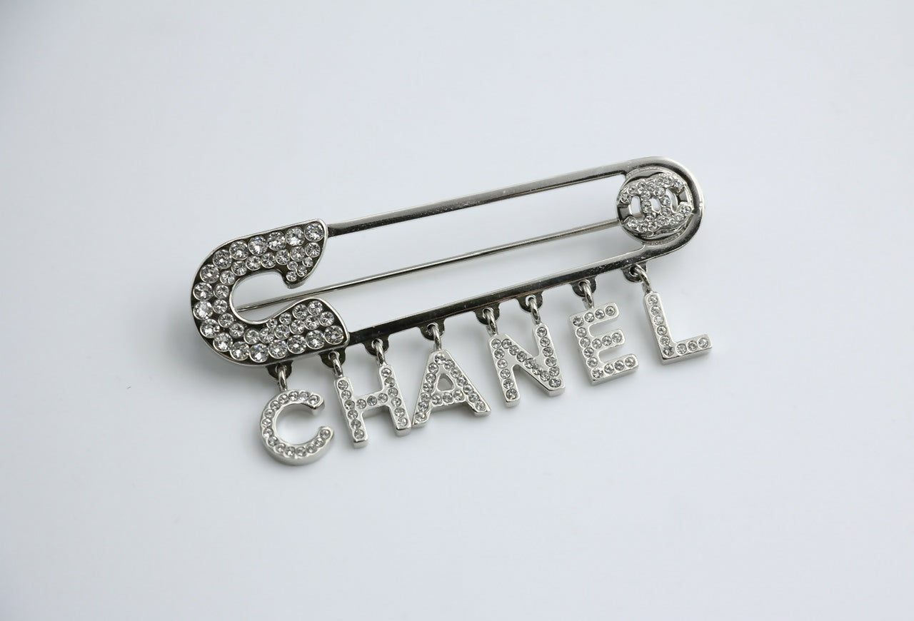 Chanel B18P Rhinestone Metal Thick ‘CHANEL’ Brooch