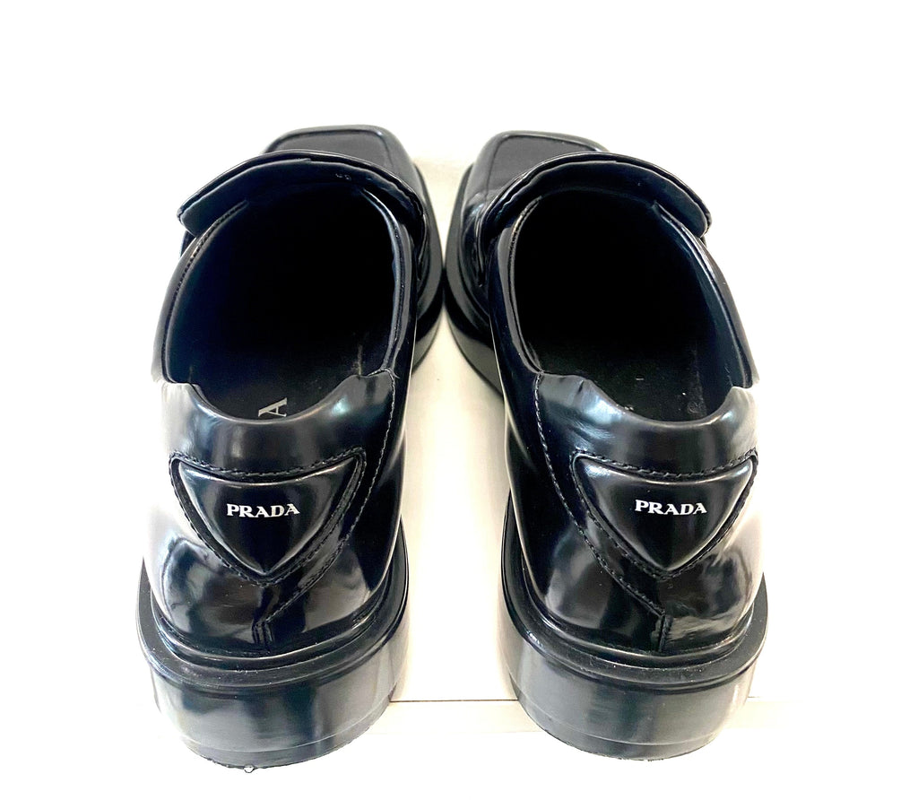 PRADA TRIANGLE LOGO PATCH SLIP-ON LOAFERS