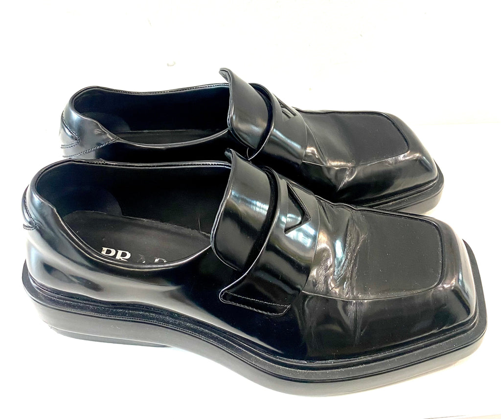 PRADA TRIANGLE LOGO PATCH SLIP-ON LOAFERS