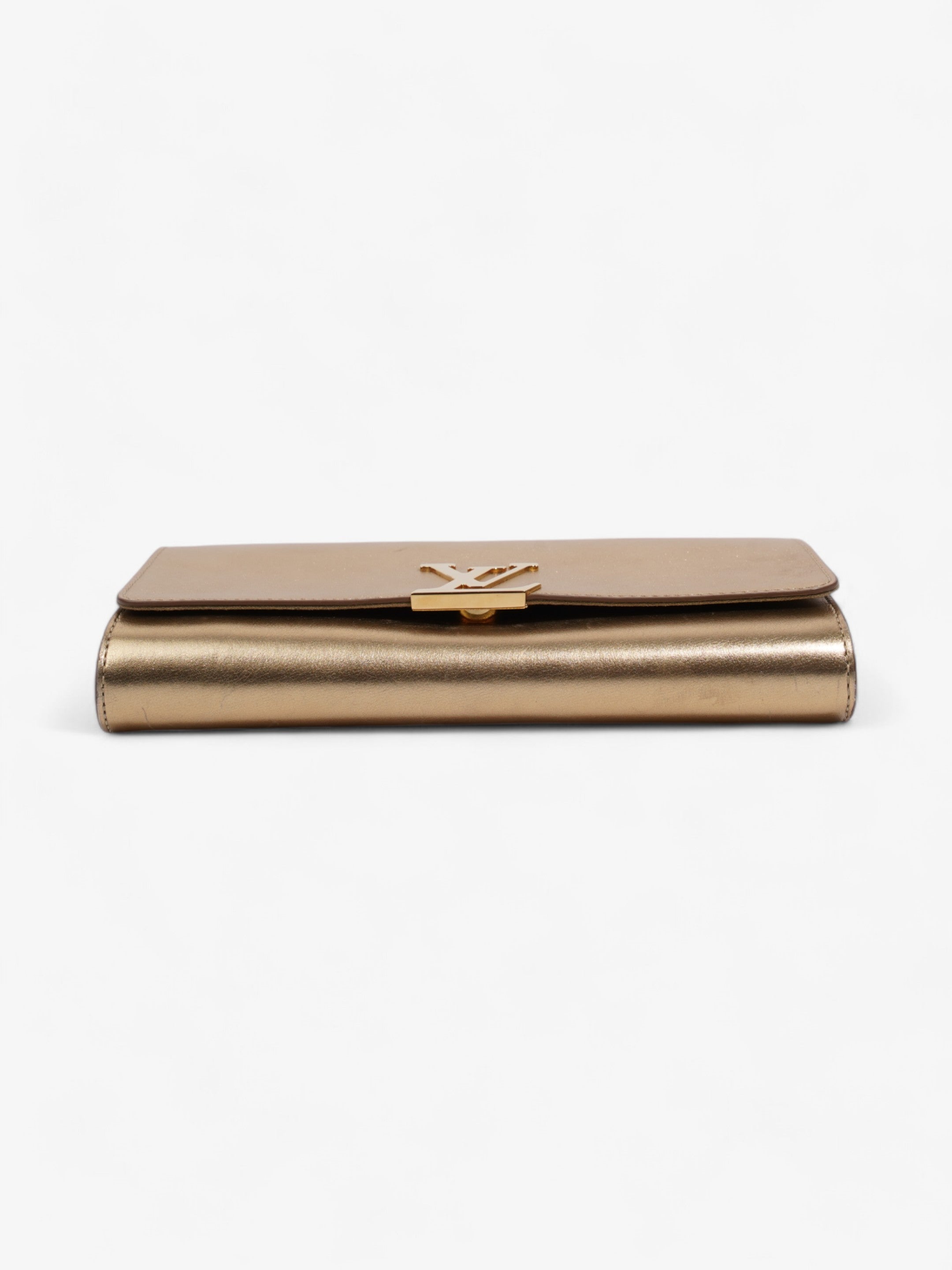 Louis Vuitton Louise Clutch Gold Leather