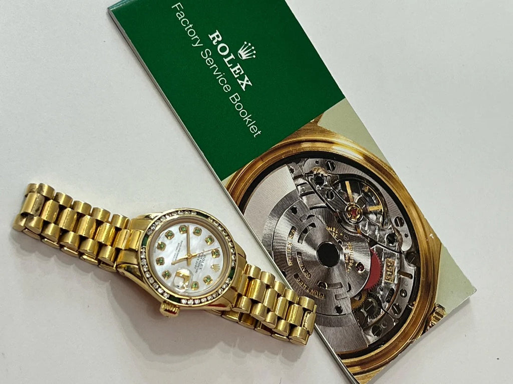 ROLEX PRESIDENTIAL 18K 28MM WITH CUSTOM AFTERMARKET DIAMOND AND EMERALD BEZEL MOP FACE