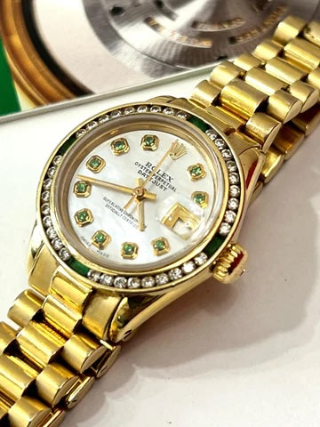 ROLEX PRESIDENTIAL 18K 28MM WITH CUSTOM AFTERMARKET DIAMOND AND EMERALD BEZEL MOP FACE