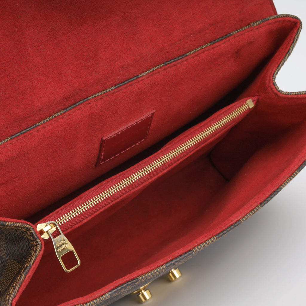 Louis Vuitton Caissa Clutch