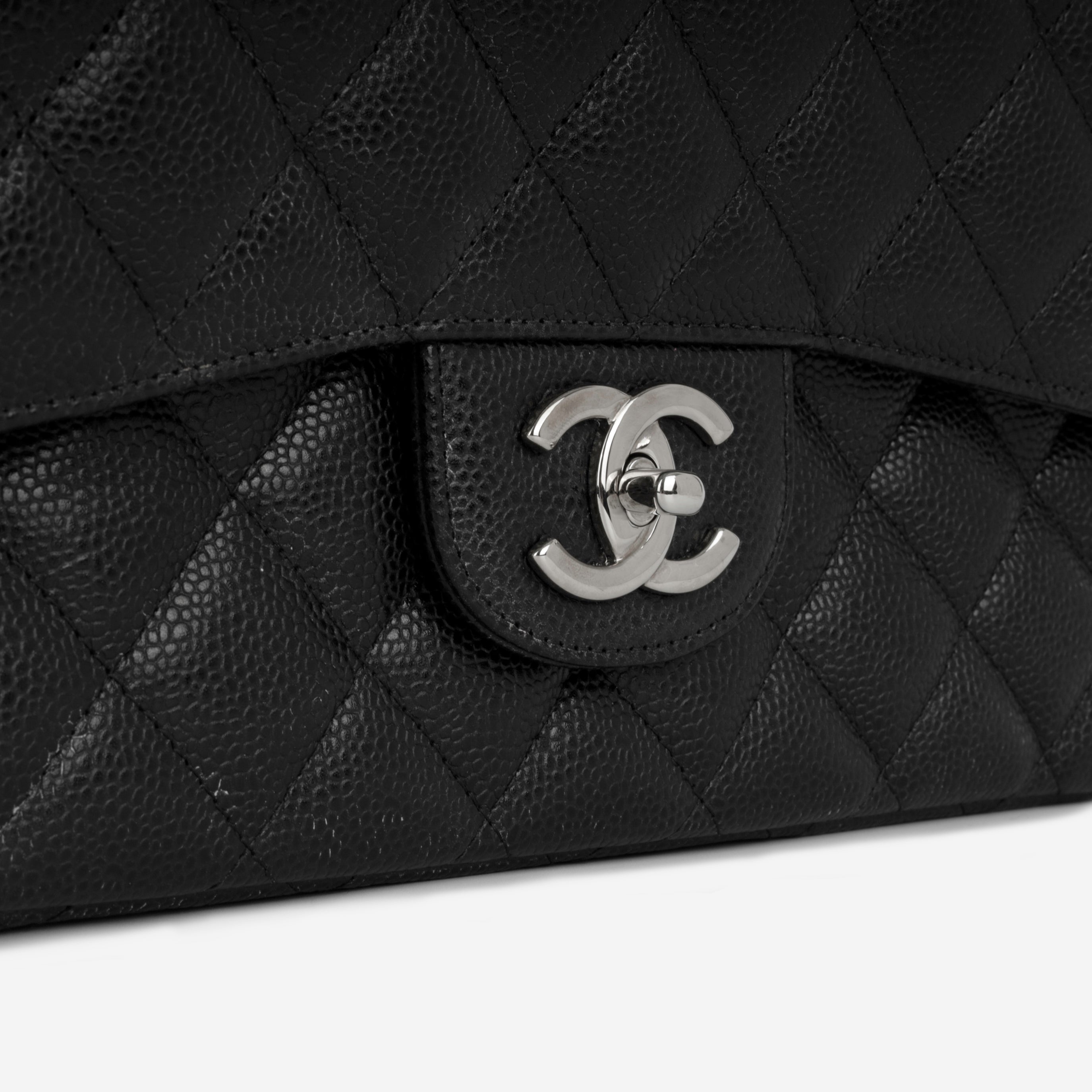 Chanel Maxi Classic Flap - Black Caviar
