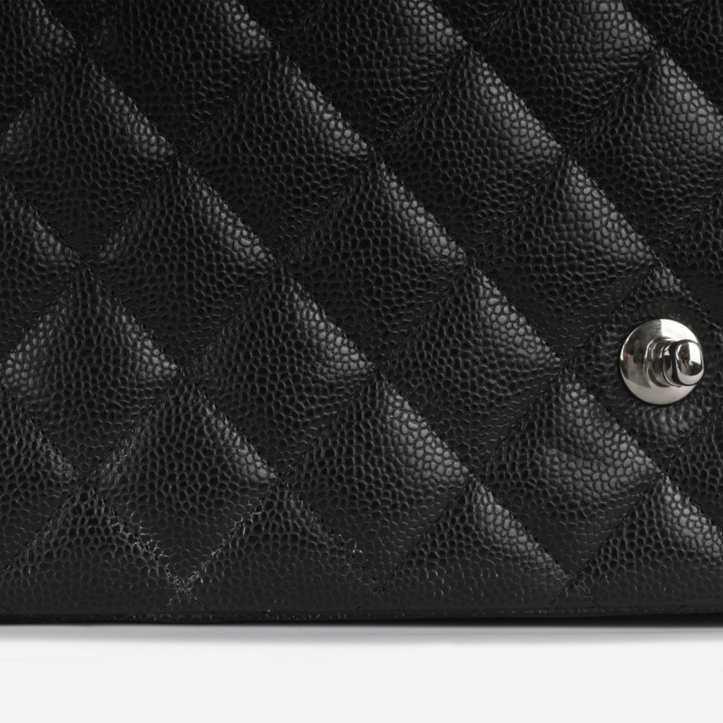 Chanel Maxi Classic Flap - Black Caviar